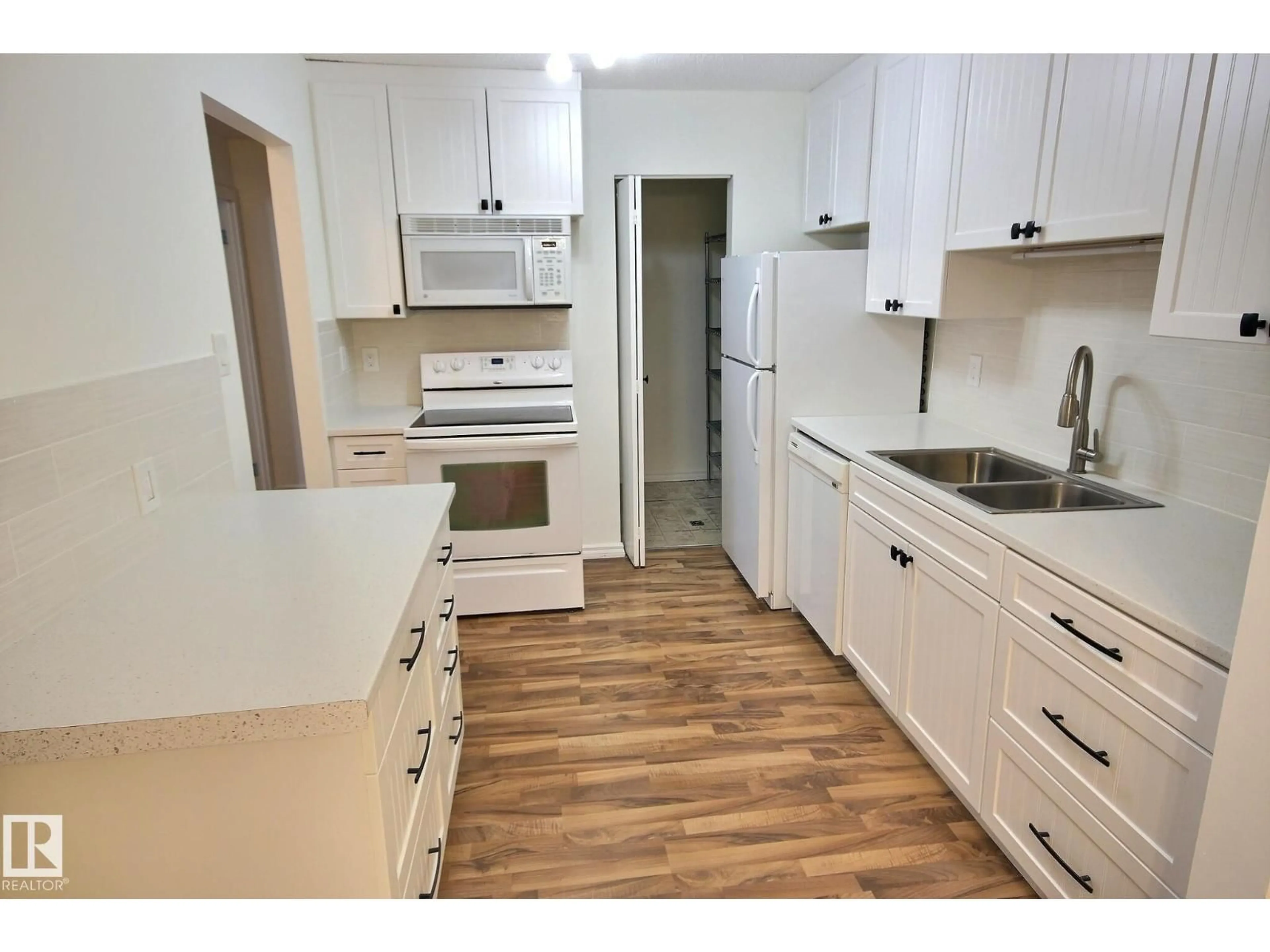 Standard kitchen, wood/laminate floor for #11 - 1503 MILL WOODS RD E, Edmonton Alberta T6L4C2