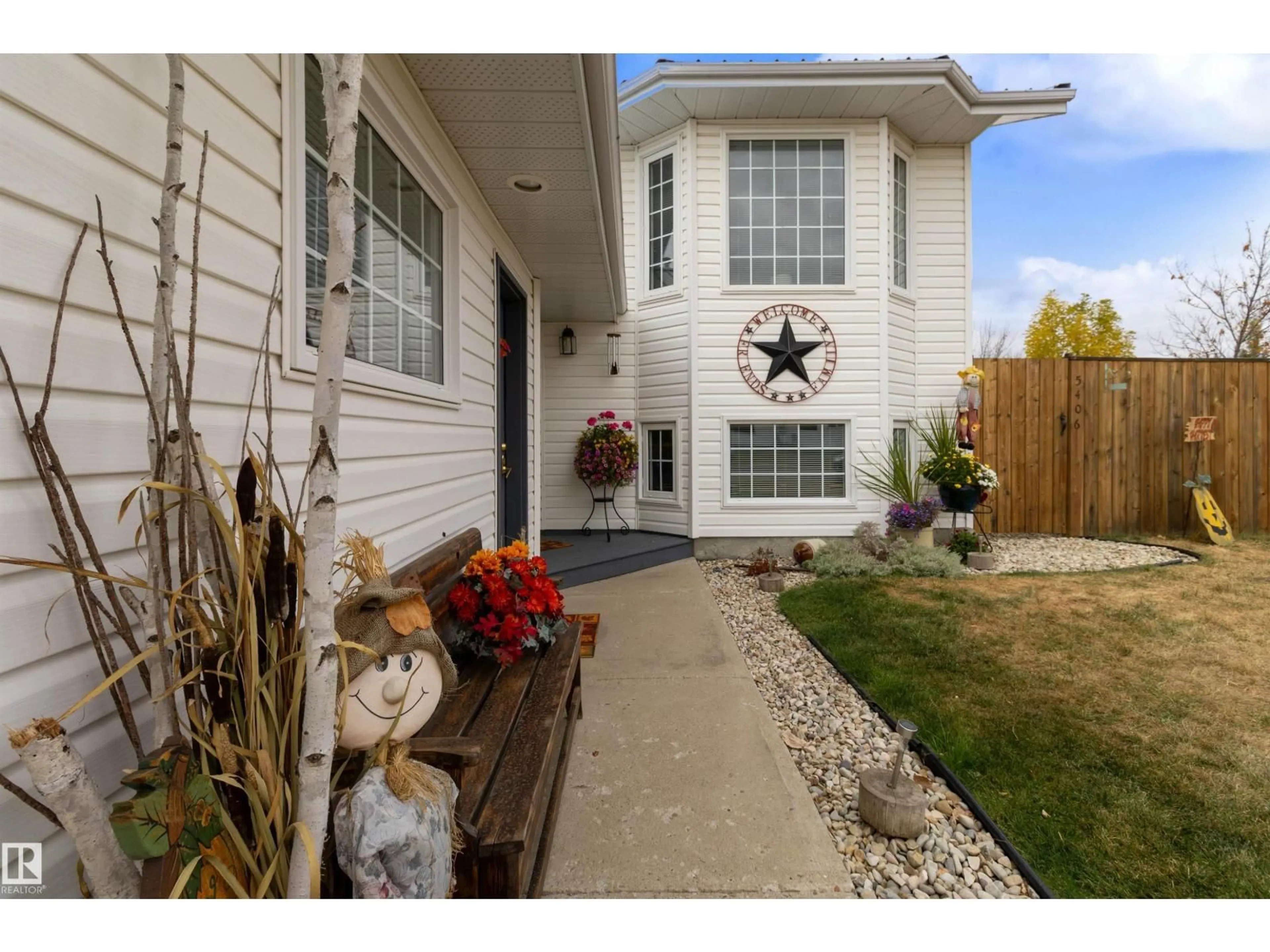 Home with vinyl exterior material, street for 5406 45 ST, Tofield Alberta T0B4J0