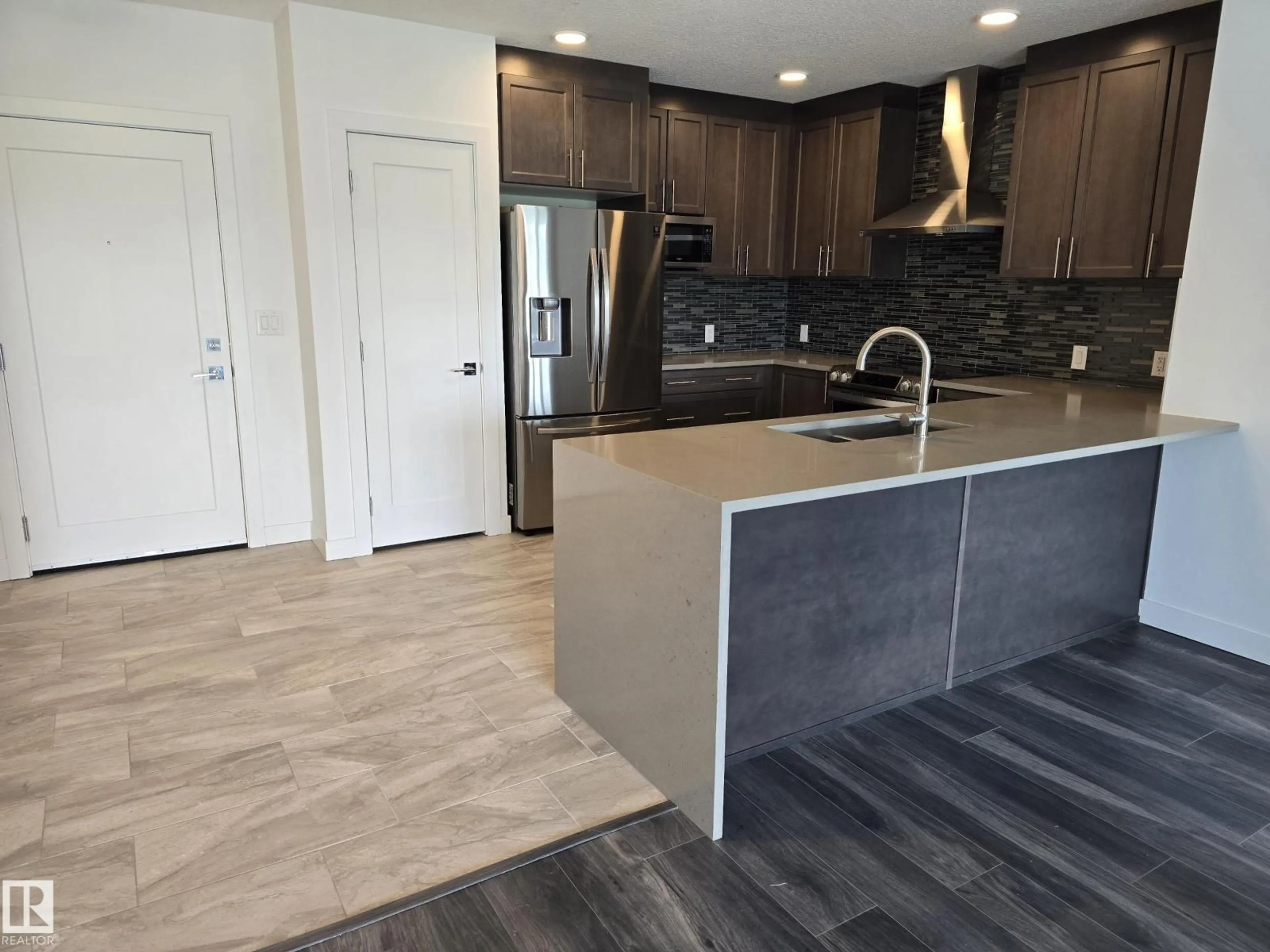 Open concept kitchen, unknown for #206 - 1316 WINDERMERE WY, Edmonton Alberta T6W0P1