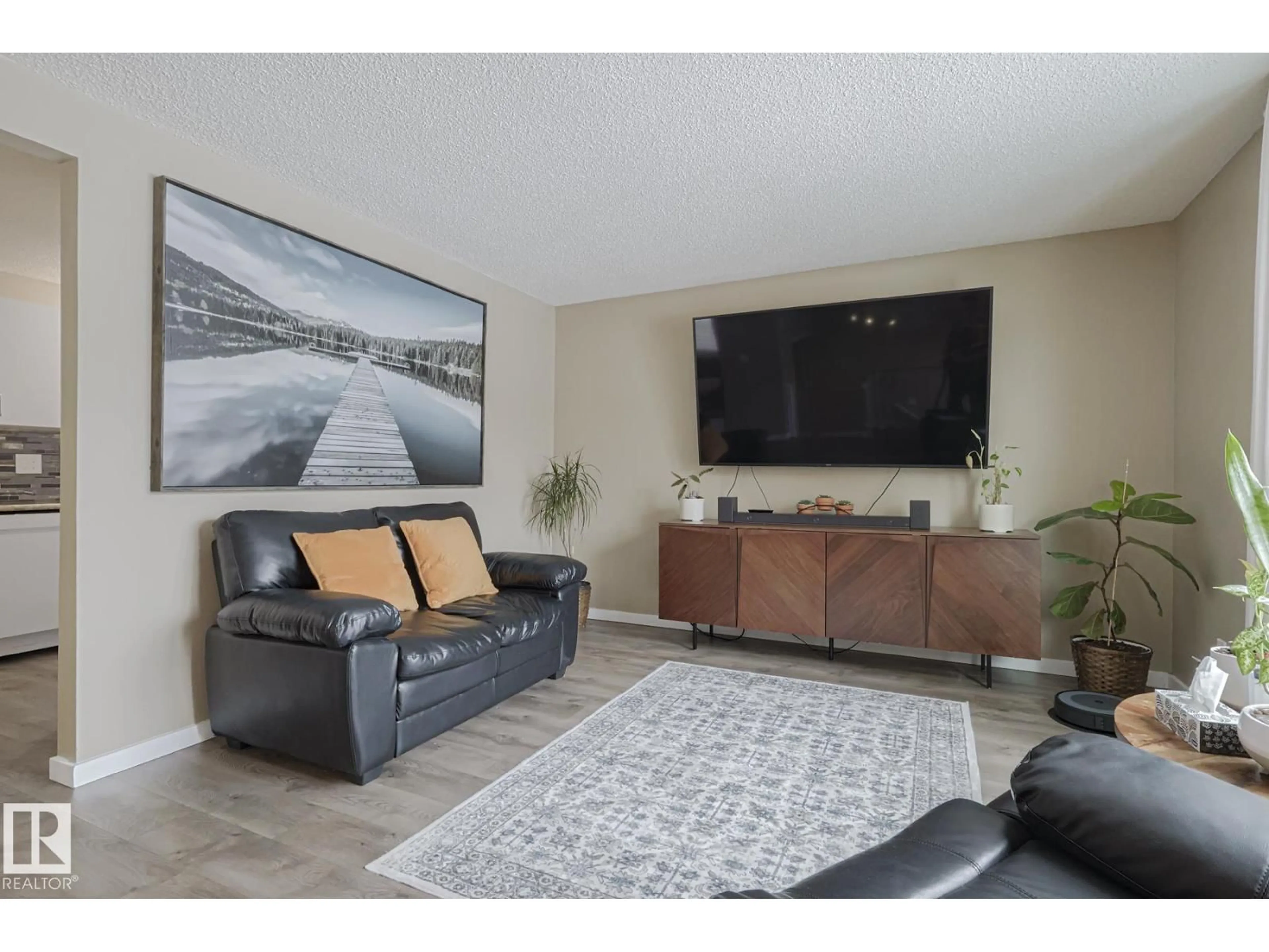 Living room with furniture, unknown for 327 KIRKPATRICK CR, Edmonton Alberta T6L5C9