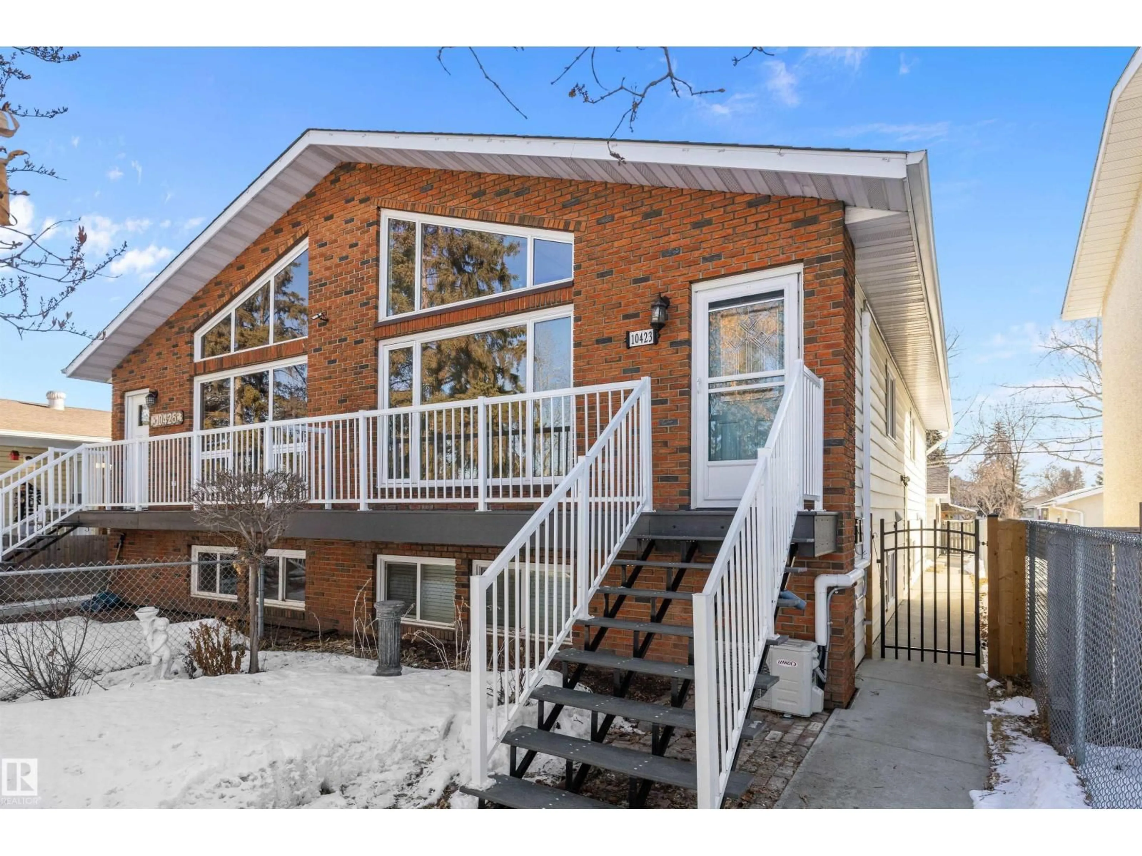 Home with brick exterior material, street for NW - 10423 150 ST, Edmonton Alberta T5P4P1