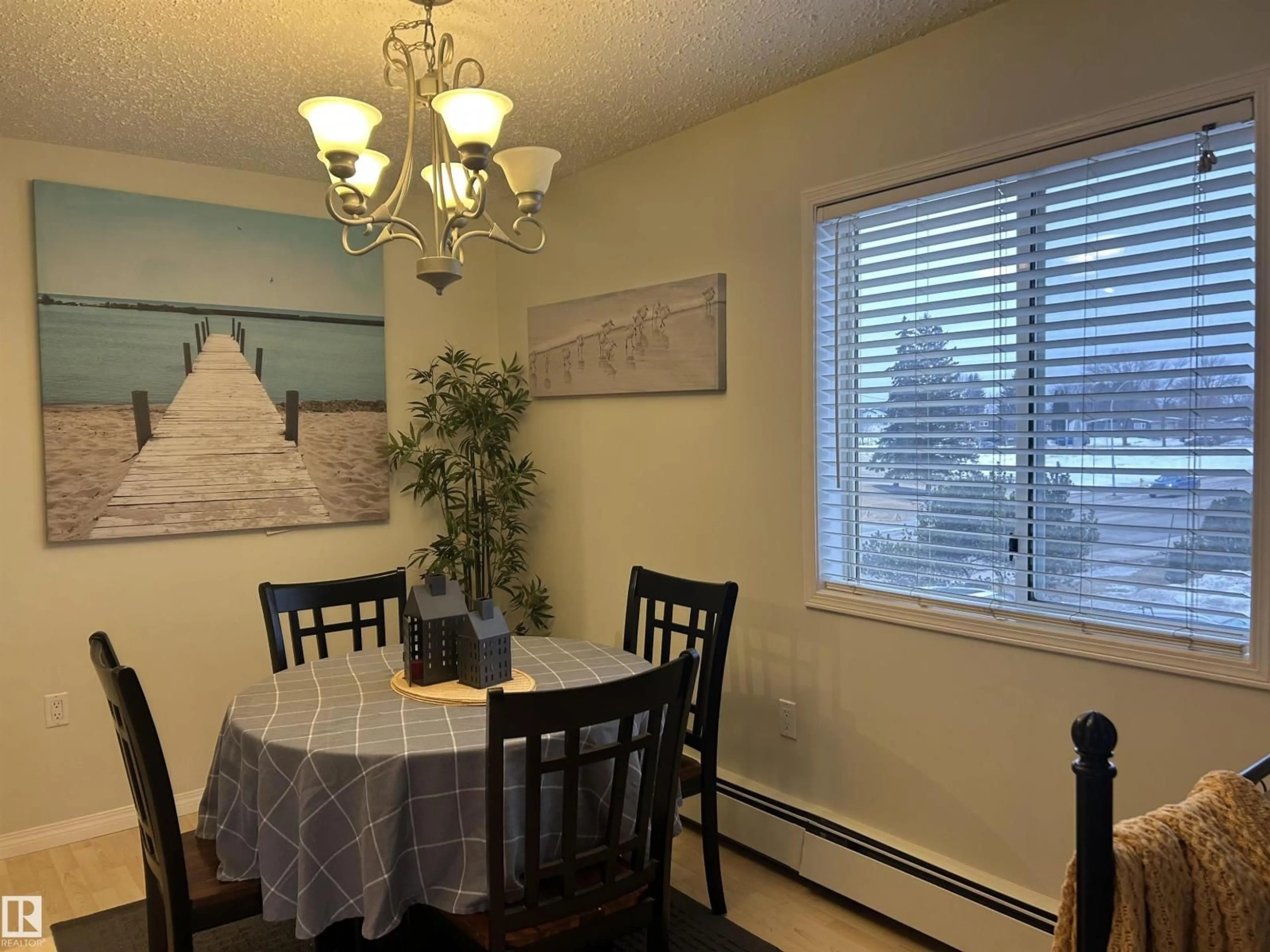 Dining room, wood/laminate floor for 203 - 6310 101 AV, Edmonton Alberta T6A0H5