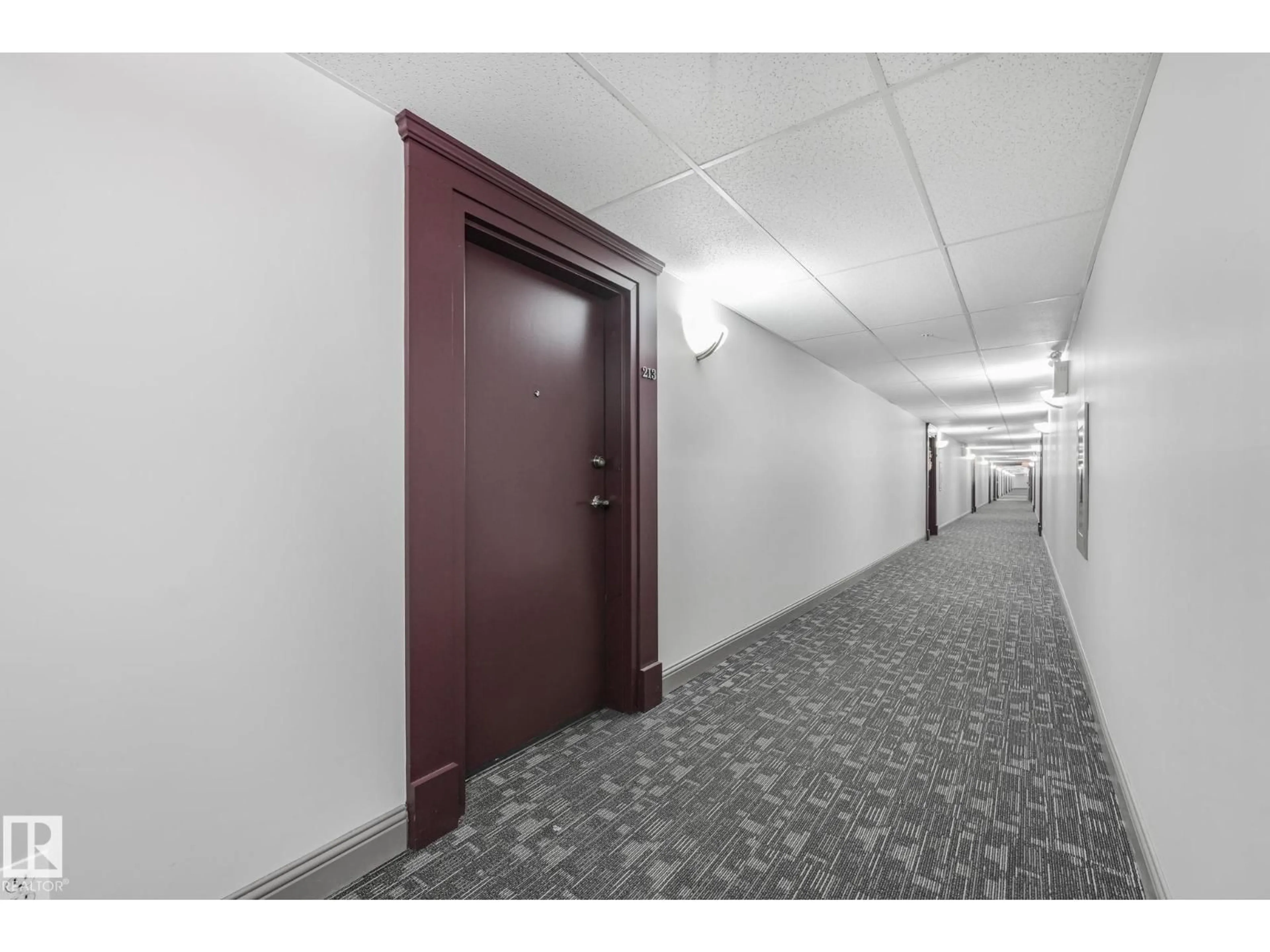 Indoor foyer for #213 - 13005 140 AV, Edmonton Alberta T6V1X1