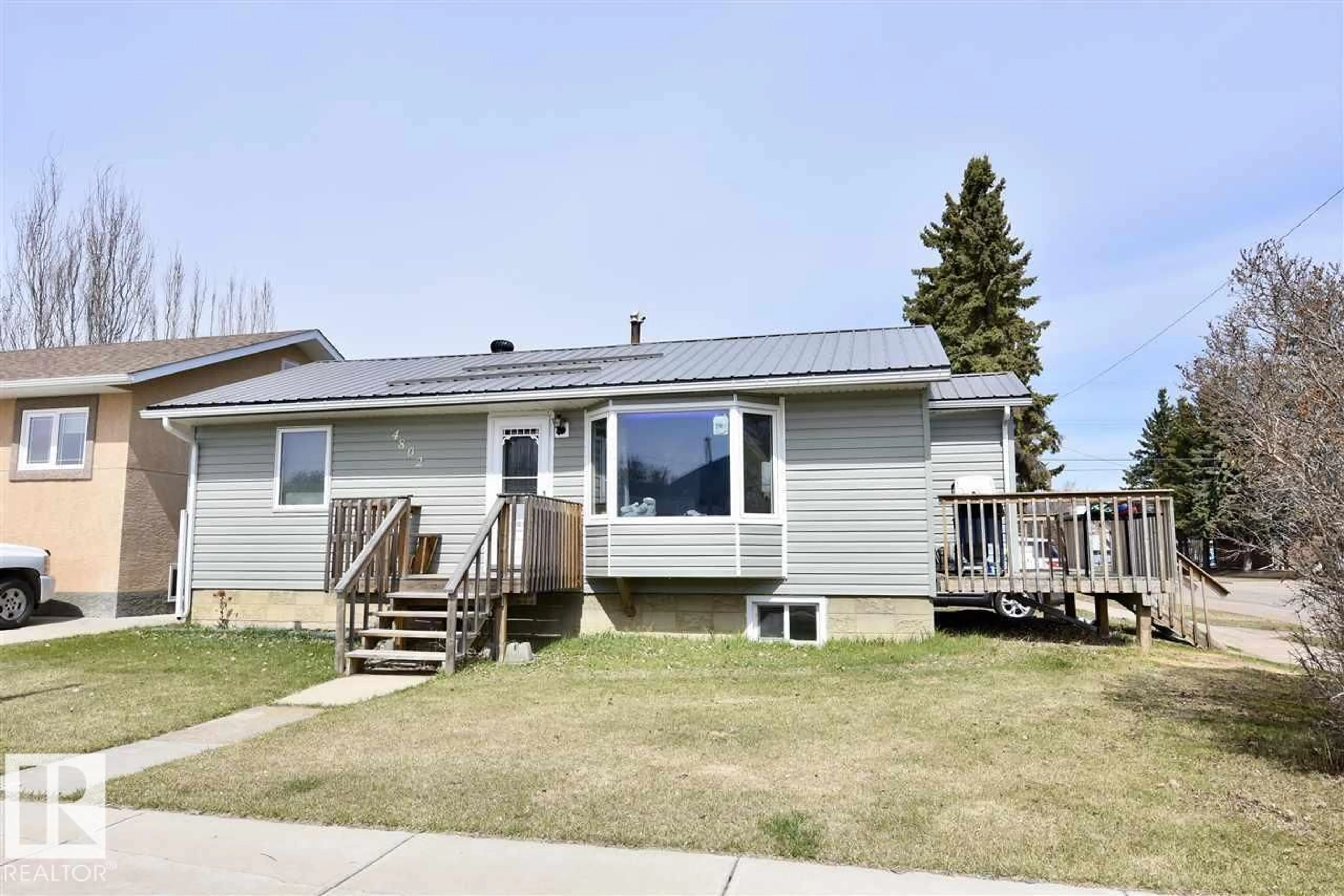 Home with vinyl exterior material, street for 4802 45 AV, St. Paul Town Alberta T0A3A3
