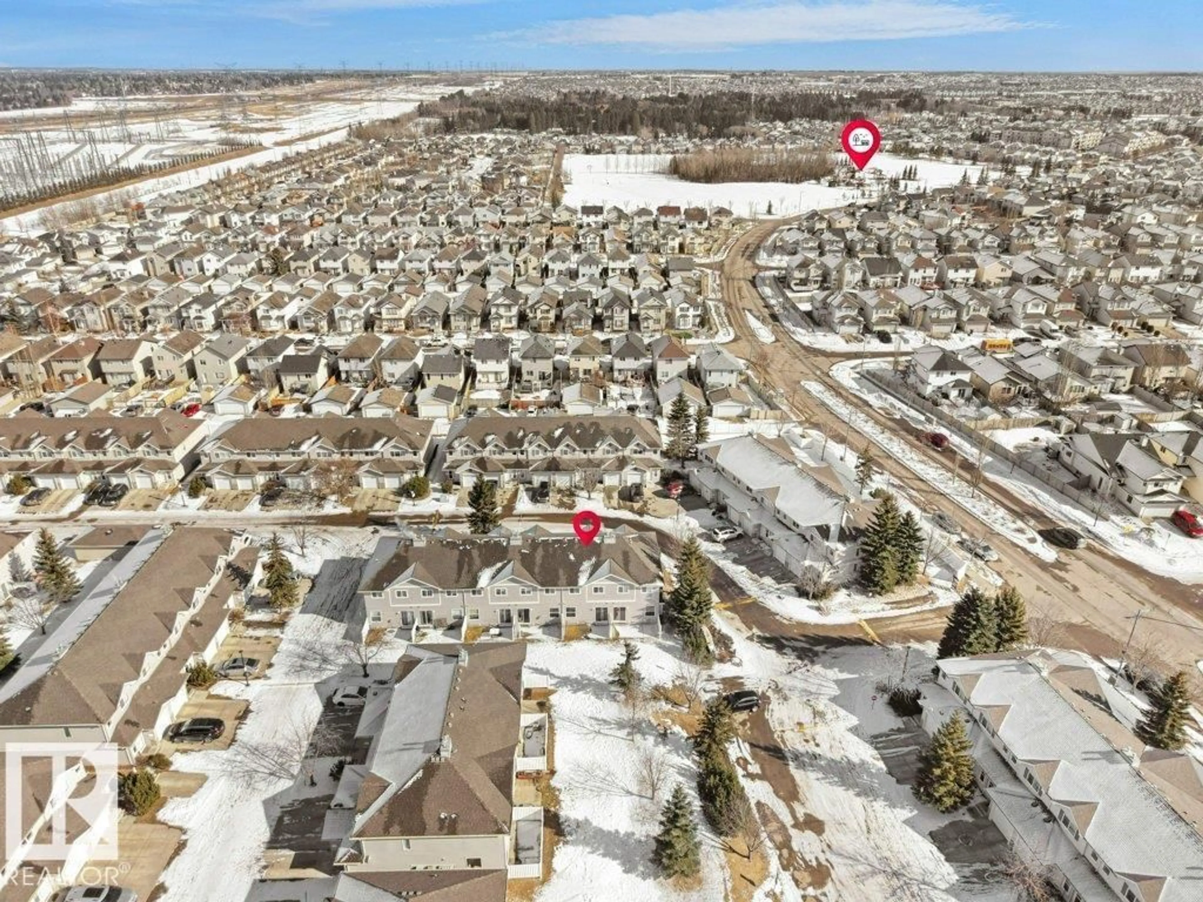 A pic from outside/outdoor area/front of a property/back of a property/a pic from drone, street for 230 - 196 EDWARDS DR, Edmonton Alberta T6X1G7