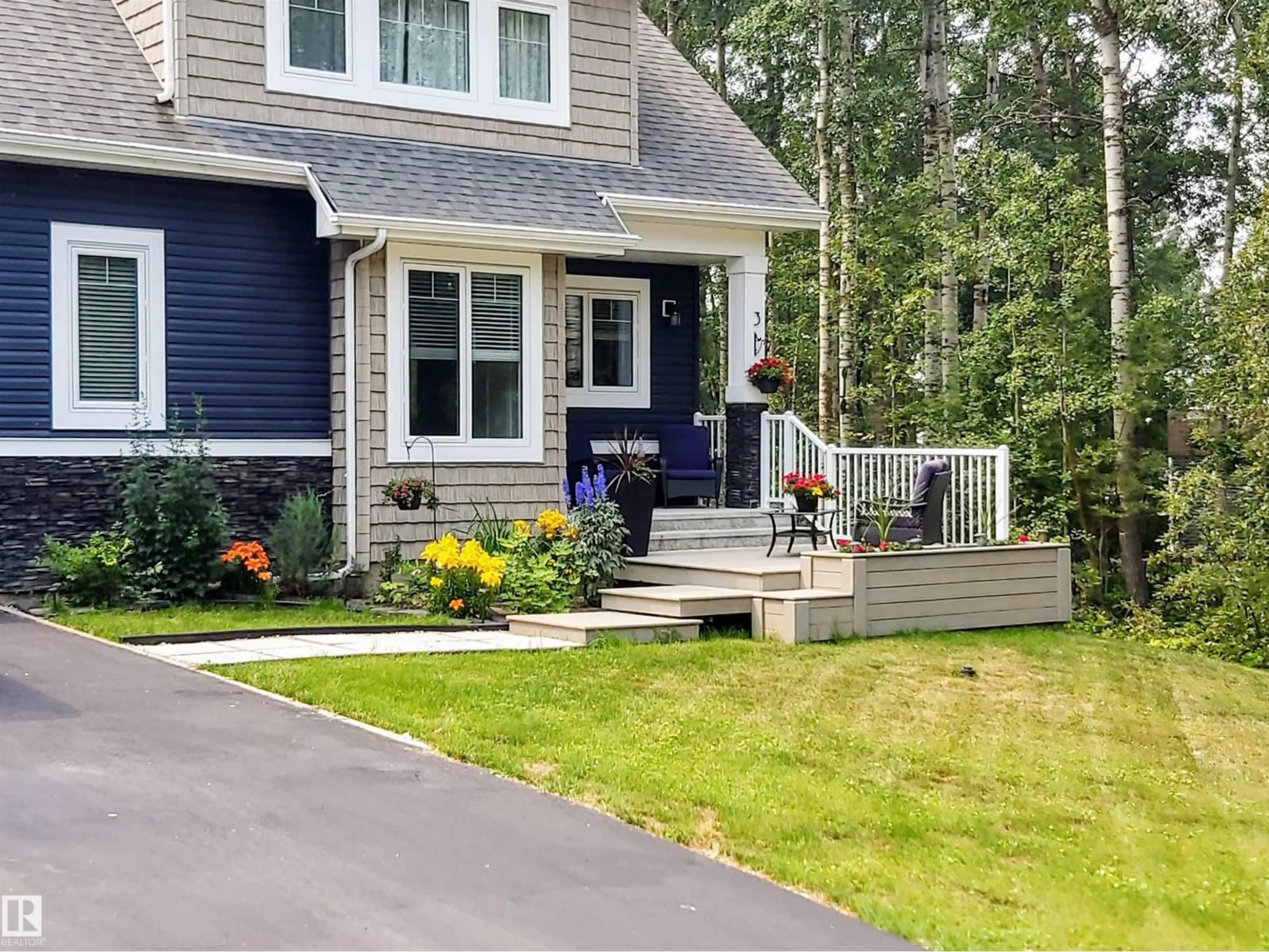 Home with vinyl exterior material, street for 3 CONIFER CR, Rural Lac Ste. Anne County Alberta T0E0V0