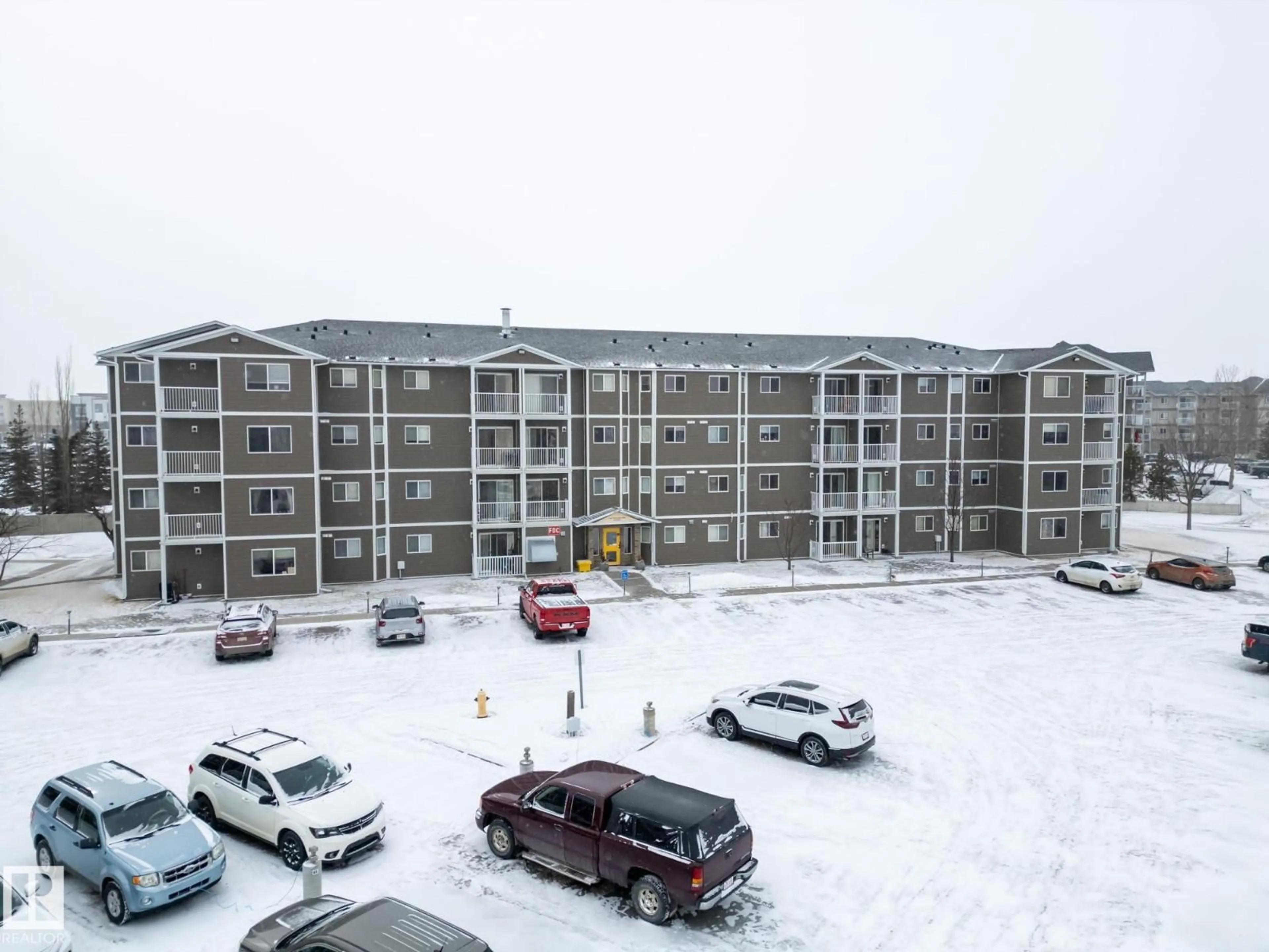 A pic from outside/outdoor area/front of a property/back of a property/a pic from drone, unknown for 205A - 260 SPRUCE RIDGE RD, Spruce Grove Alberta T7X0A1