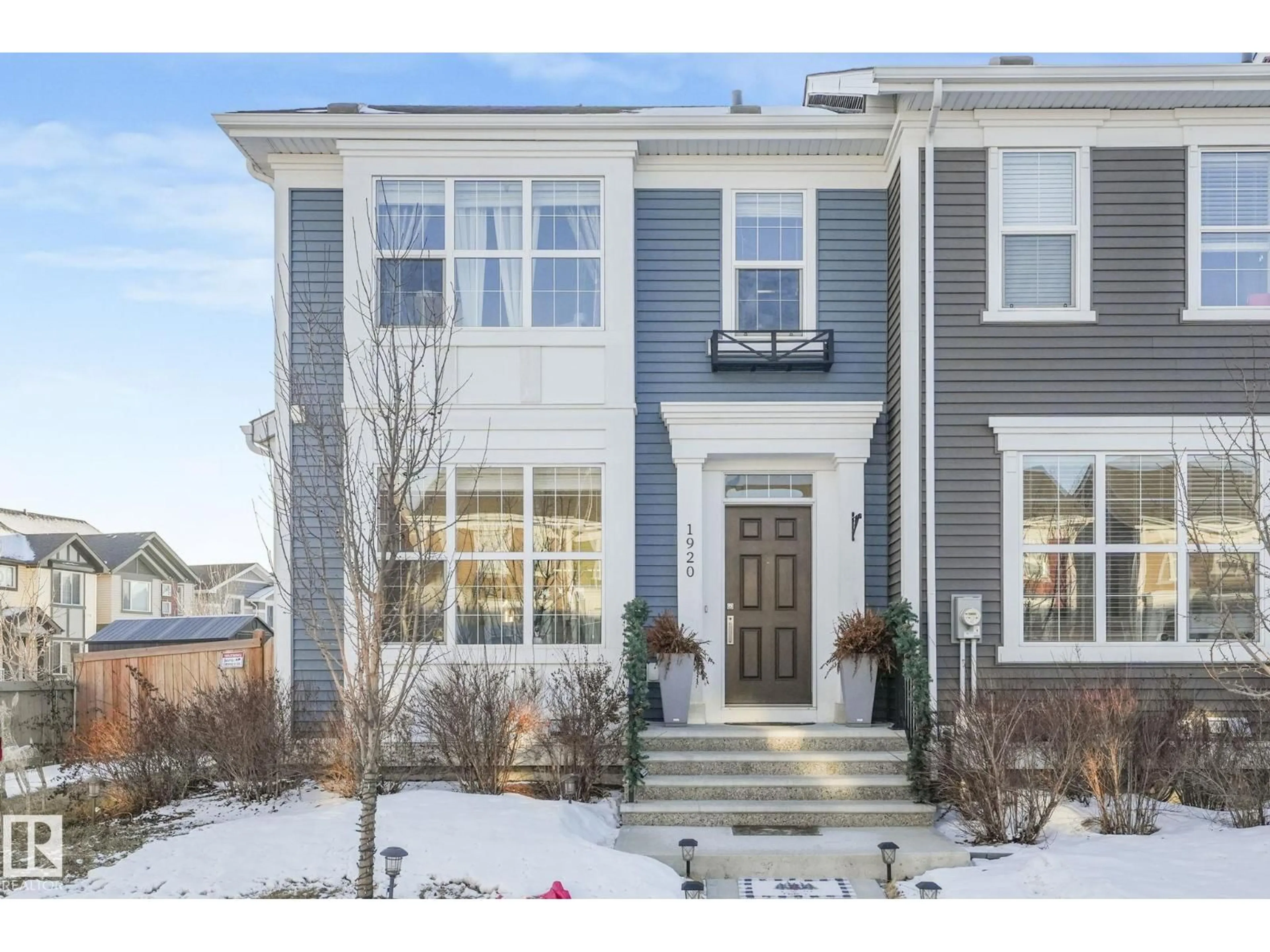 Home with vinyl exterior material, street for 1920 24 ST, Edmonton Alberta T6T2C9