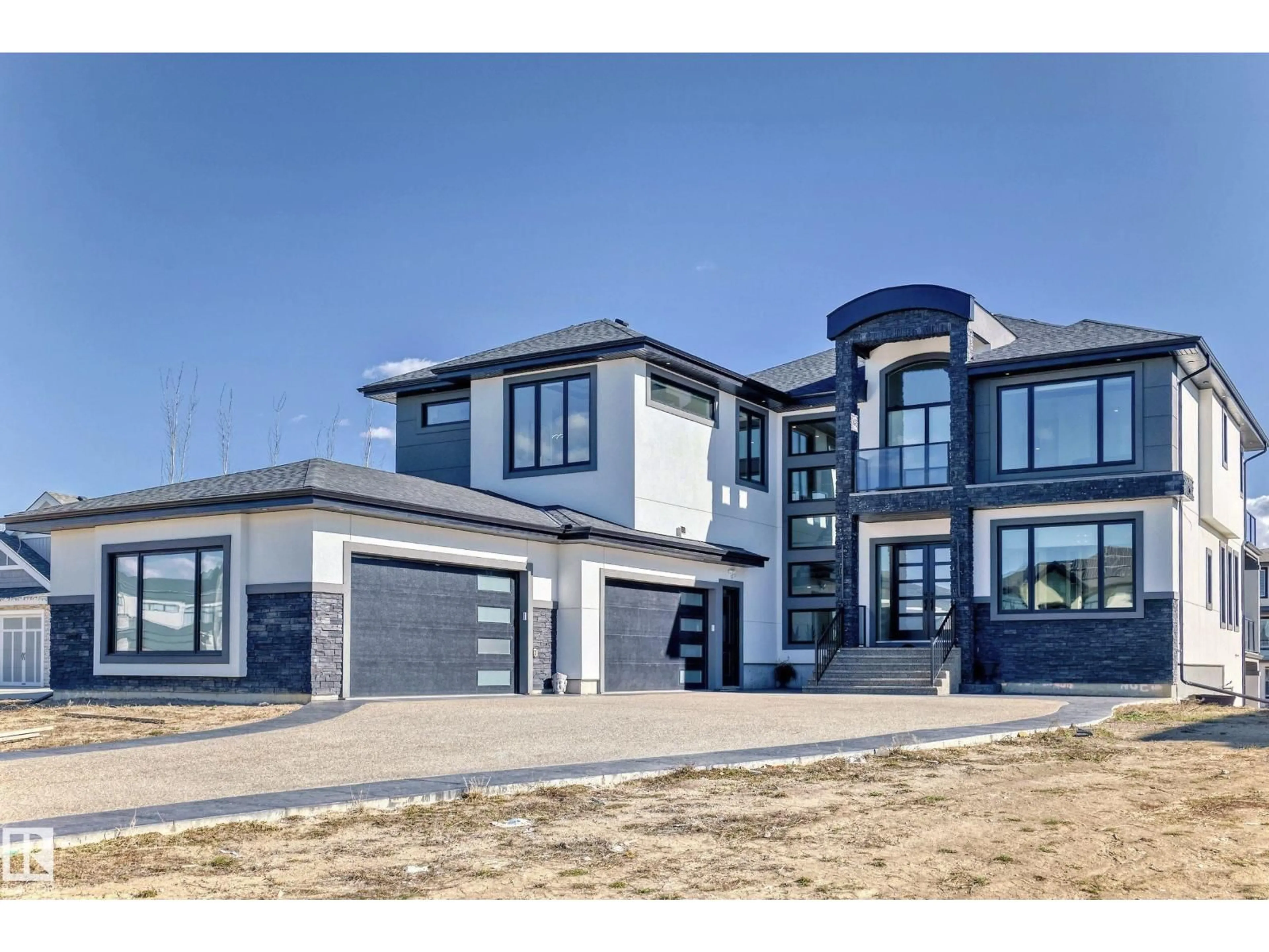 Home with brick exterior material, street for 202 - 53213 RGE ROAD 261A, Rural Parkland County Alberta T7Y1A7