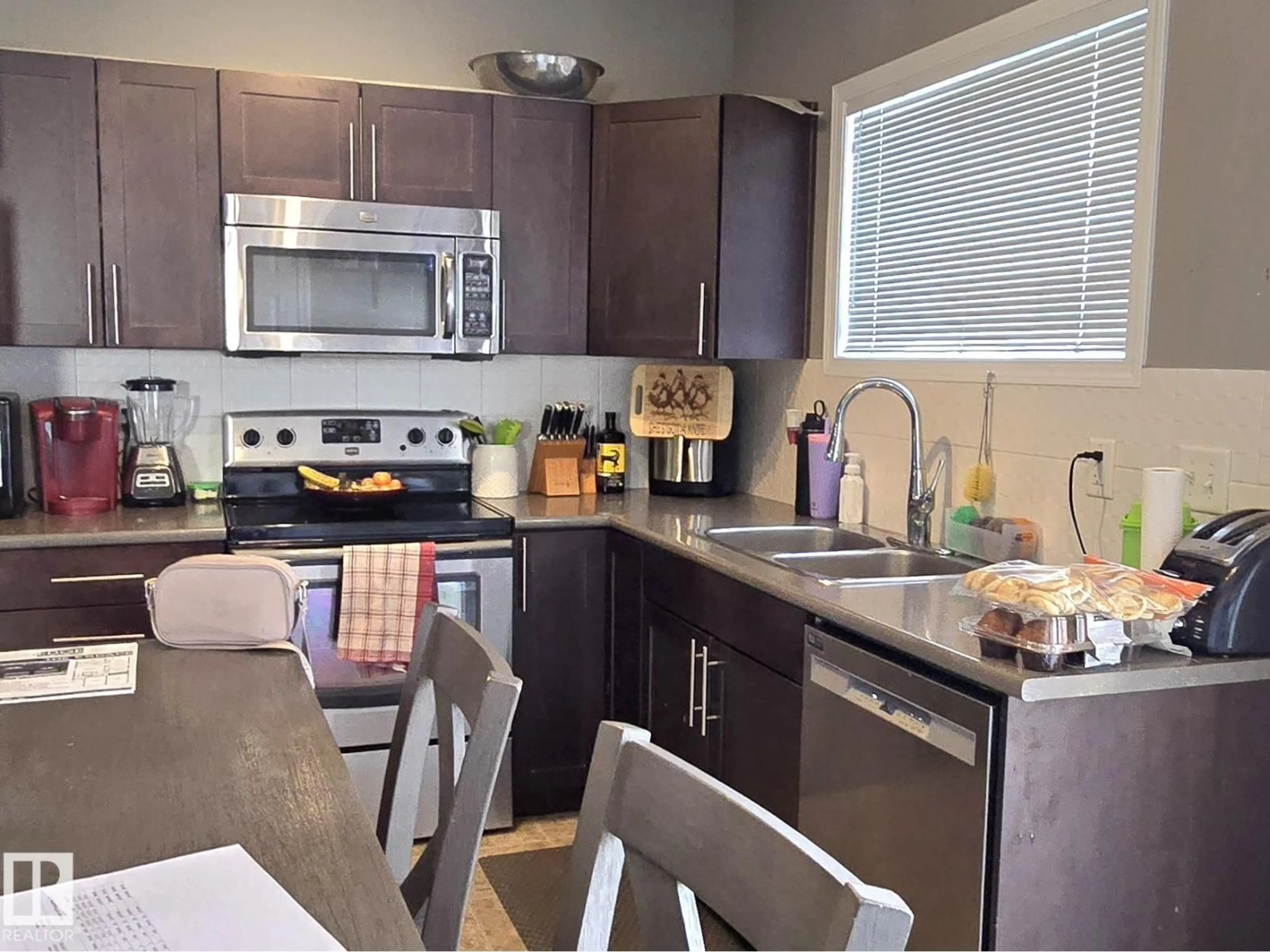 Open concept kitchen, unknown for #24 - 6520 2 AV, Edmonton Alberta T6X1S4