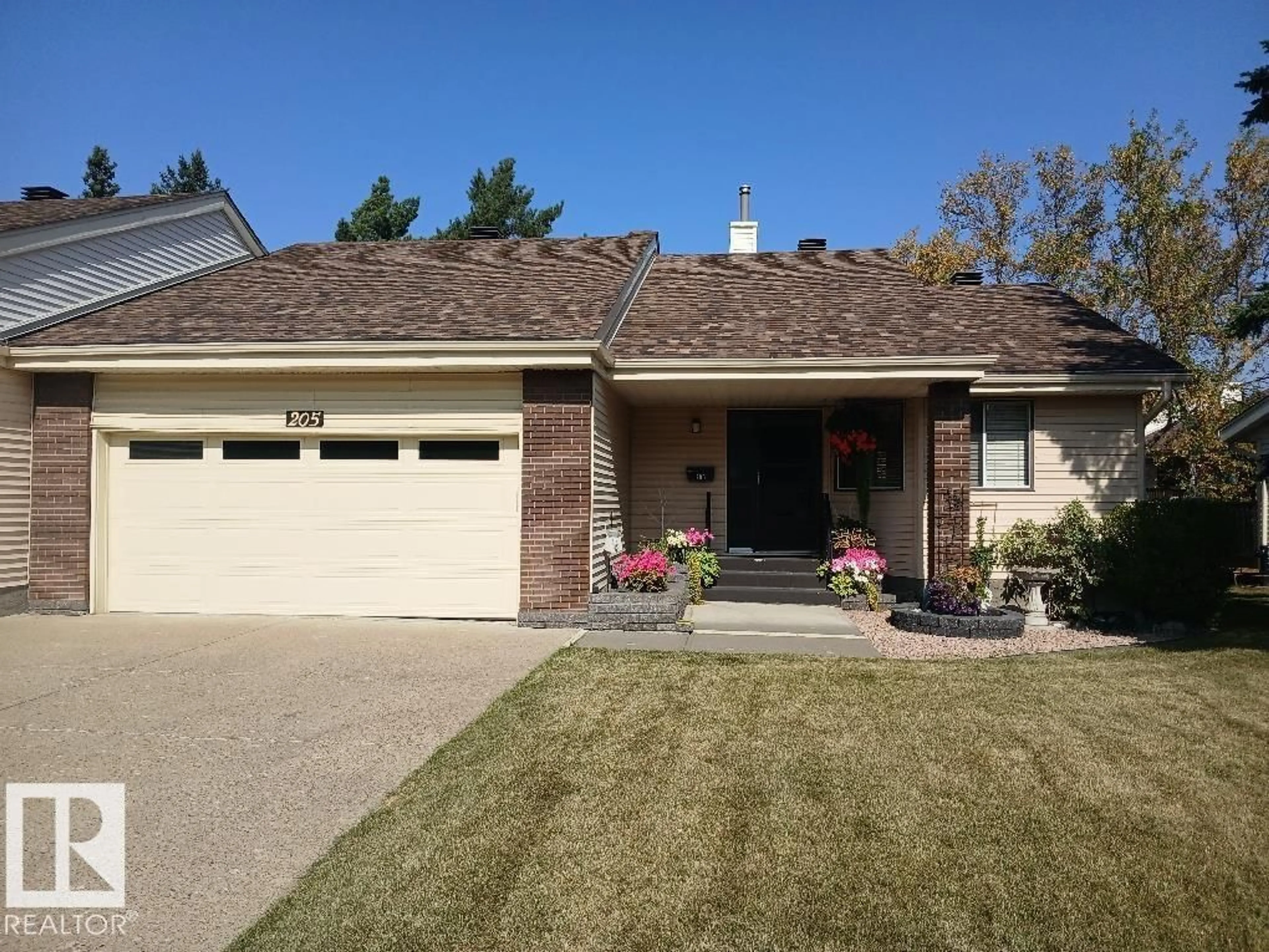 Home with brick exterior material, street for 205 OEMING RD, Edmonton Alberta T6R1M1