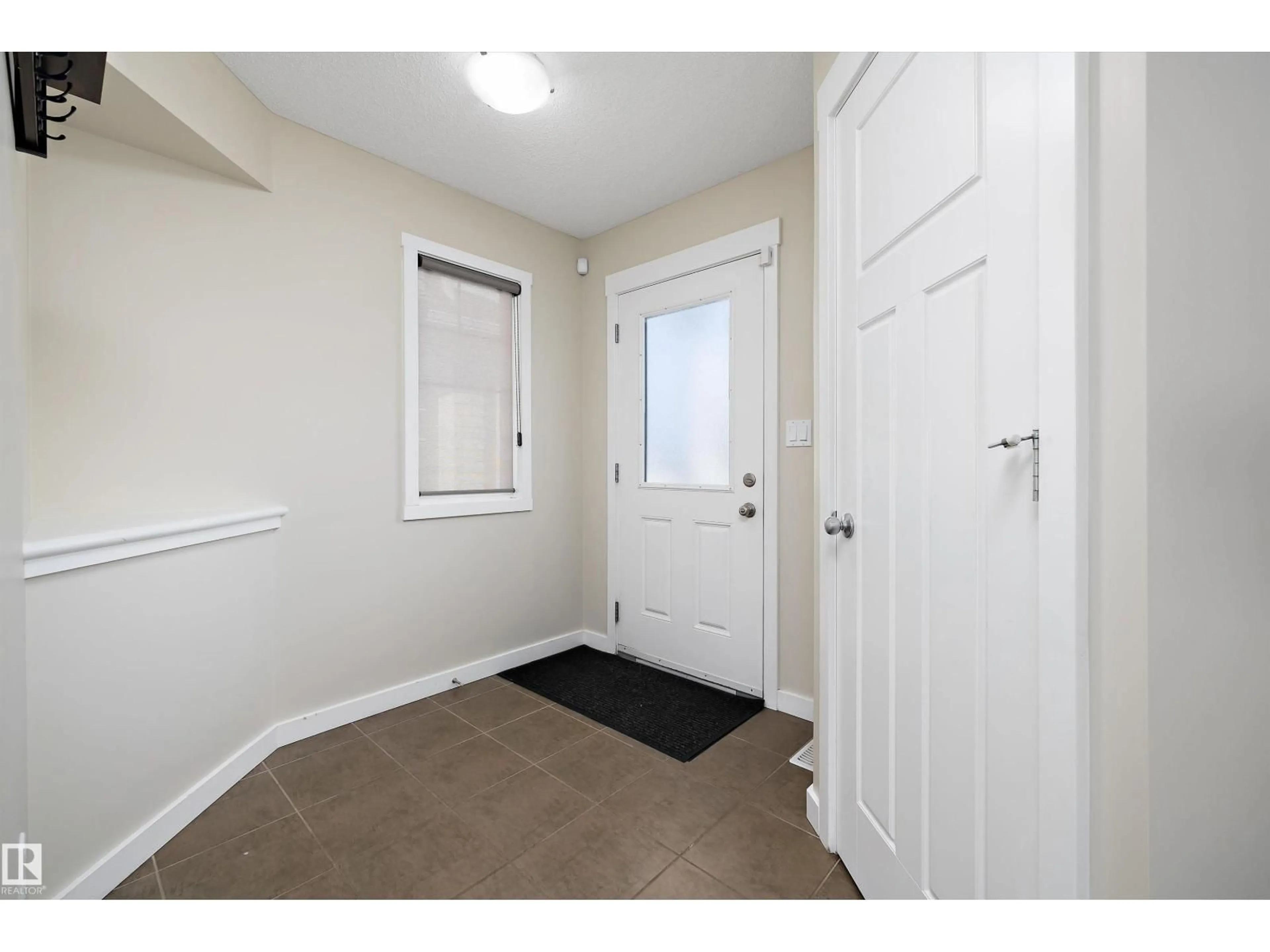 Indoor entryway for 5328 165 AV, Edmonton Alberta T5Y0H3
