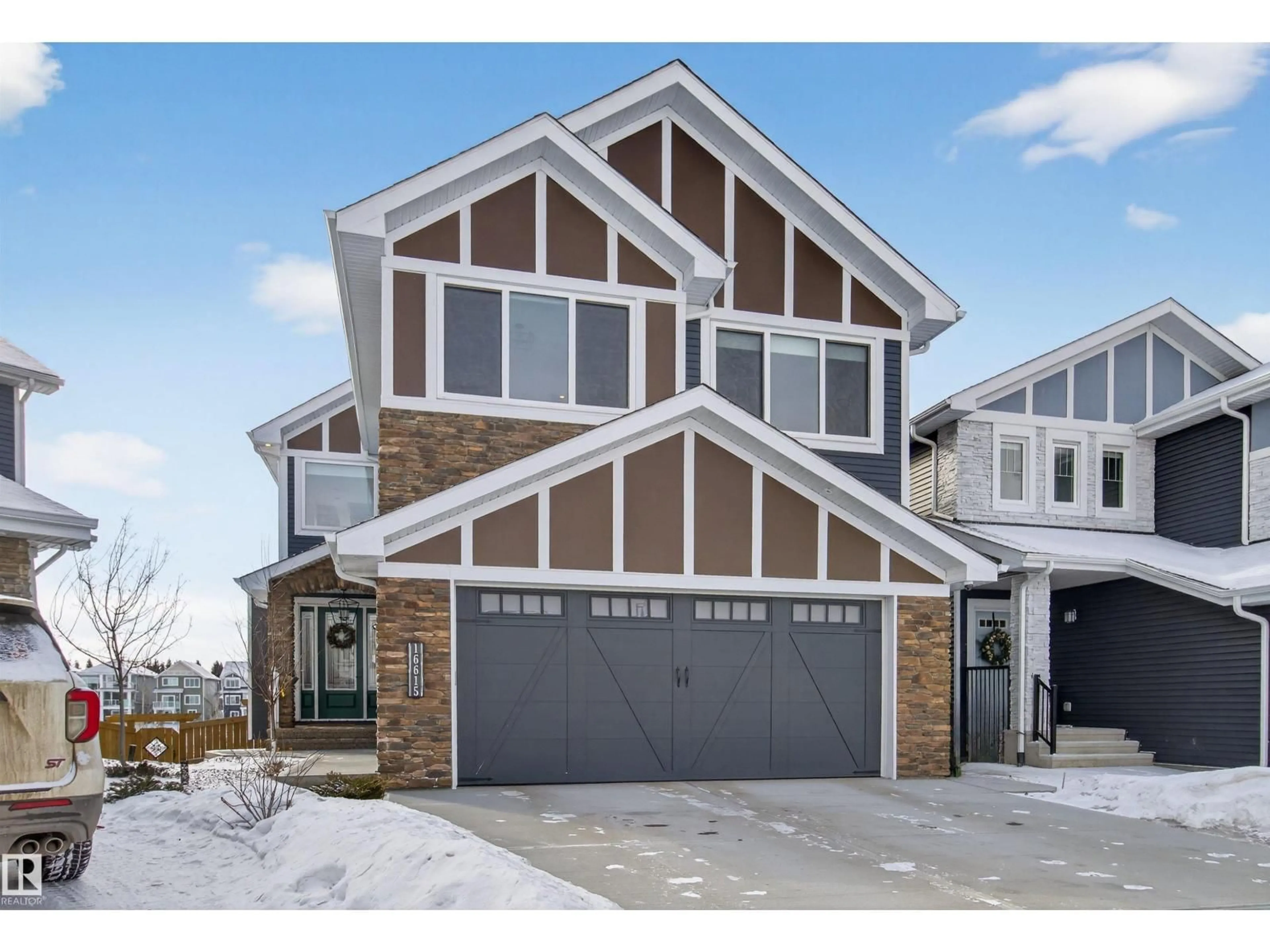 Home with vinyl exterior material, street for 16615 32 AV, Edmonton Alberta T6W4R2