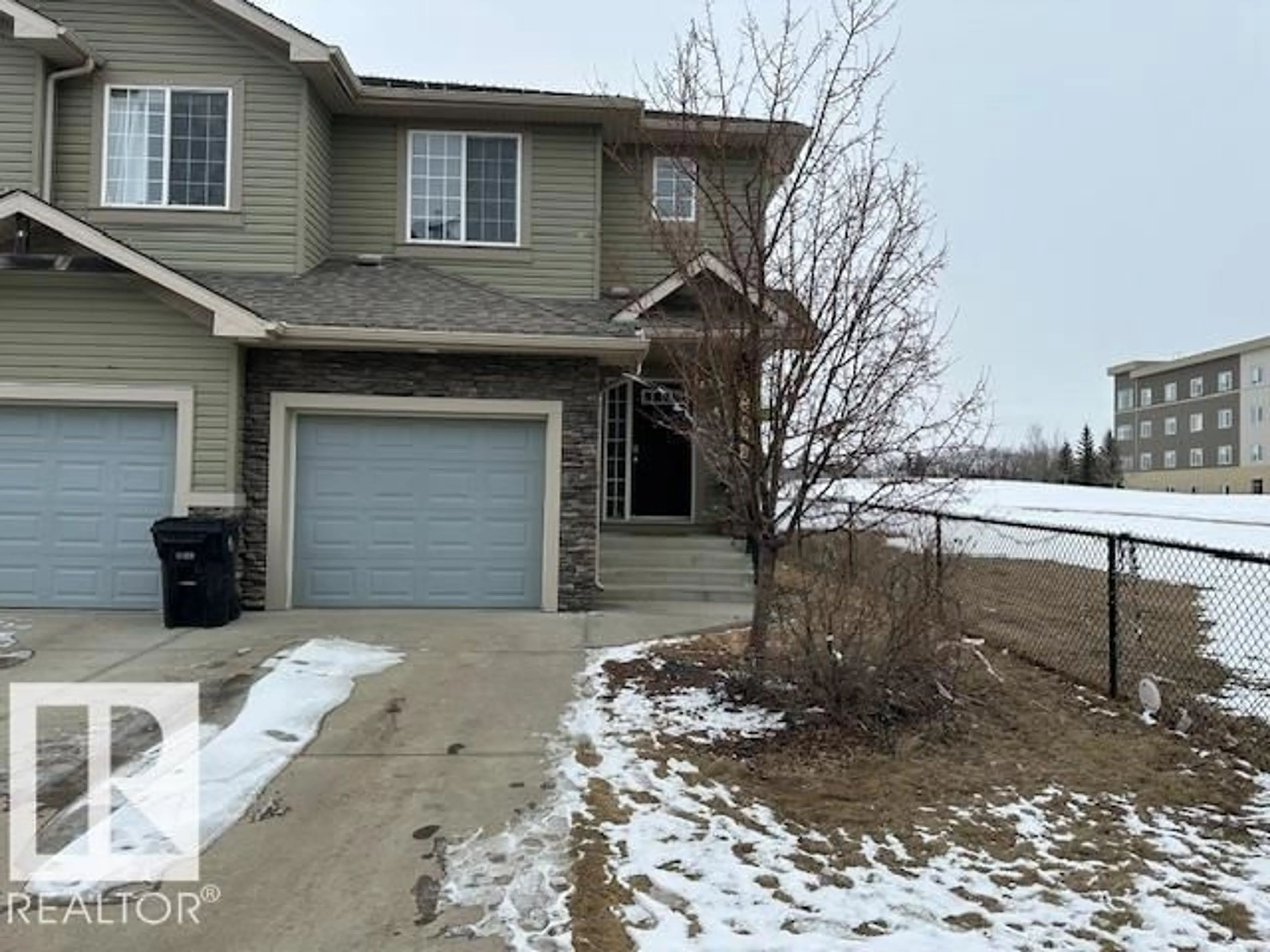 A pic from outside/outdoor area/front of a property/back of a property/a pic from drone, street for 112 MCLAUGHLIN DR, Spruce Grove Alberta T7X0K3
