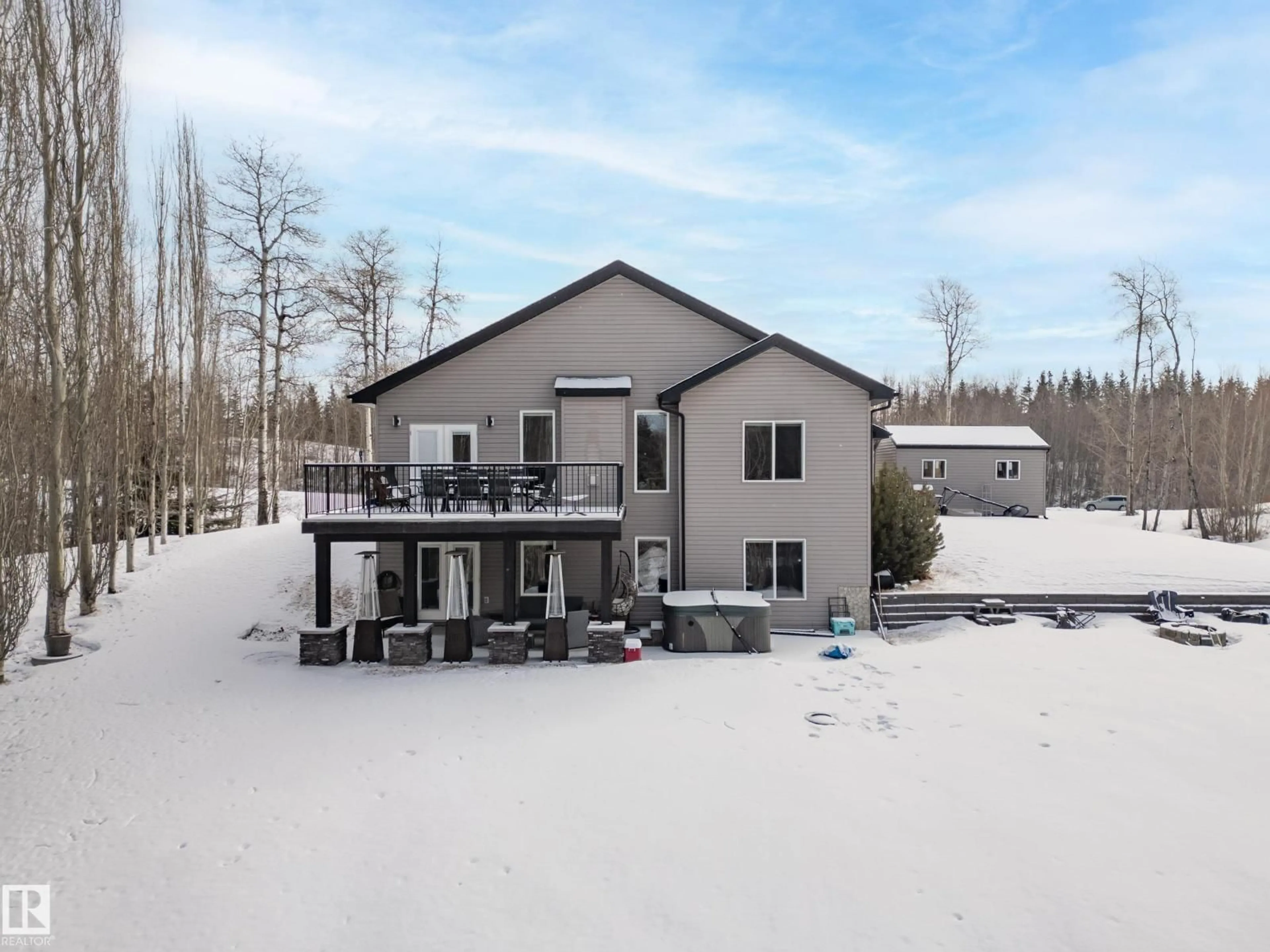 A pic from outside/outdoor area/front of a property/back of a property/a pic from drone, building for 51 - 53122 RGE ROAD 14, Rural Parkland County Alberta T7Y2T3