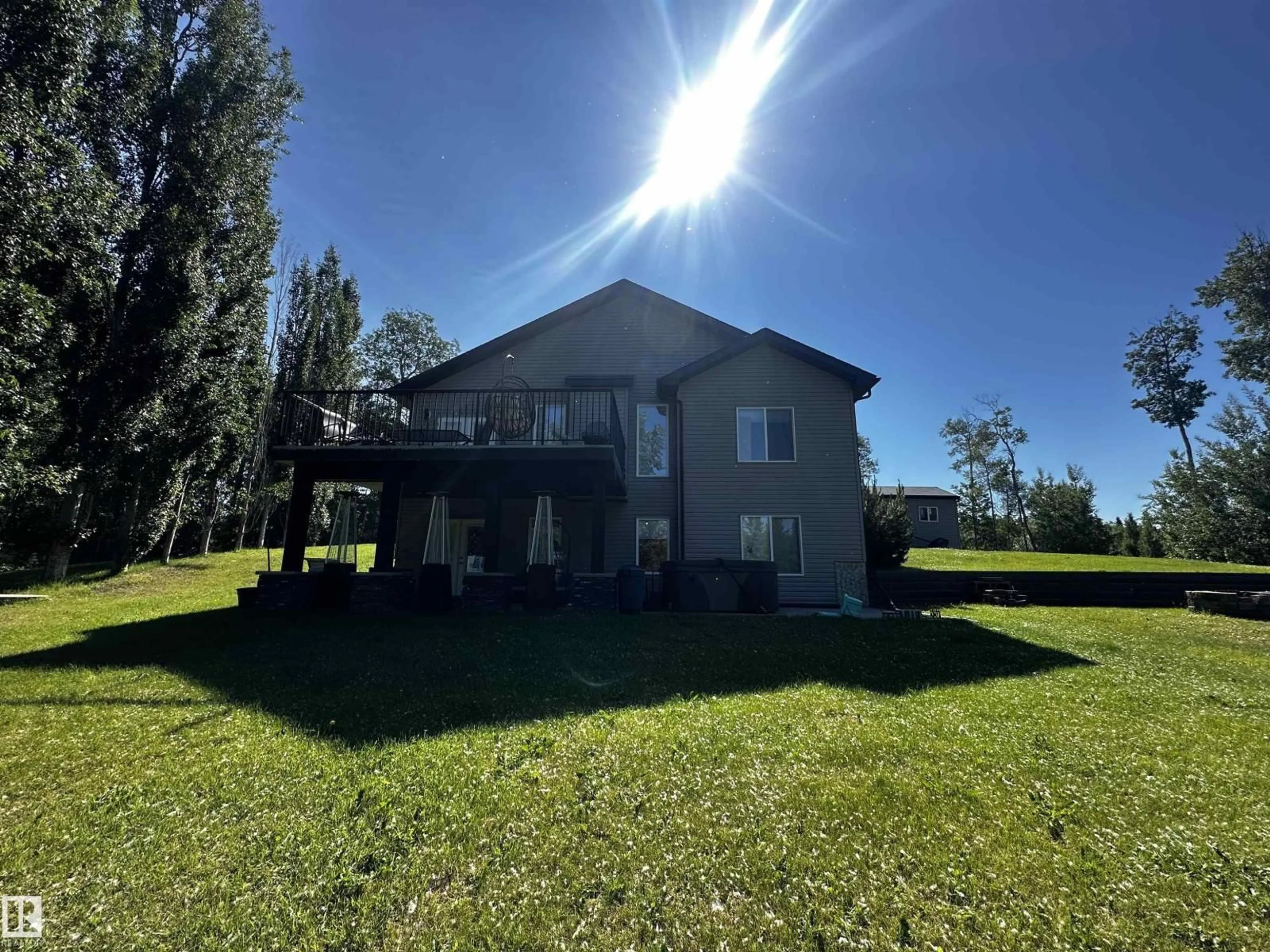 A pic from outside/outdoor area/front of a property/back of a property/a pic from drone, unknown for 51 - 53122 RGE ROAD 14, Rural Parkland County Alberta T7Y2T3
