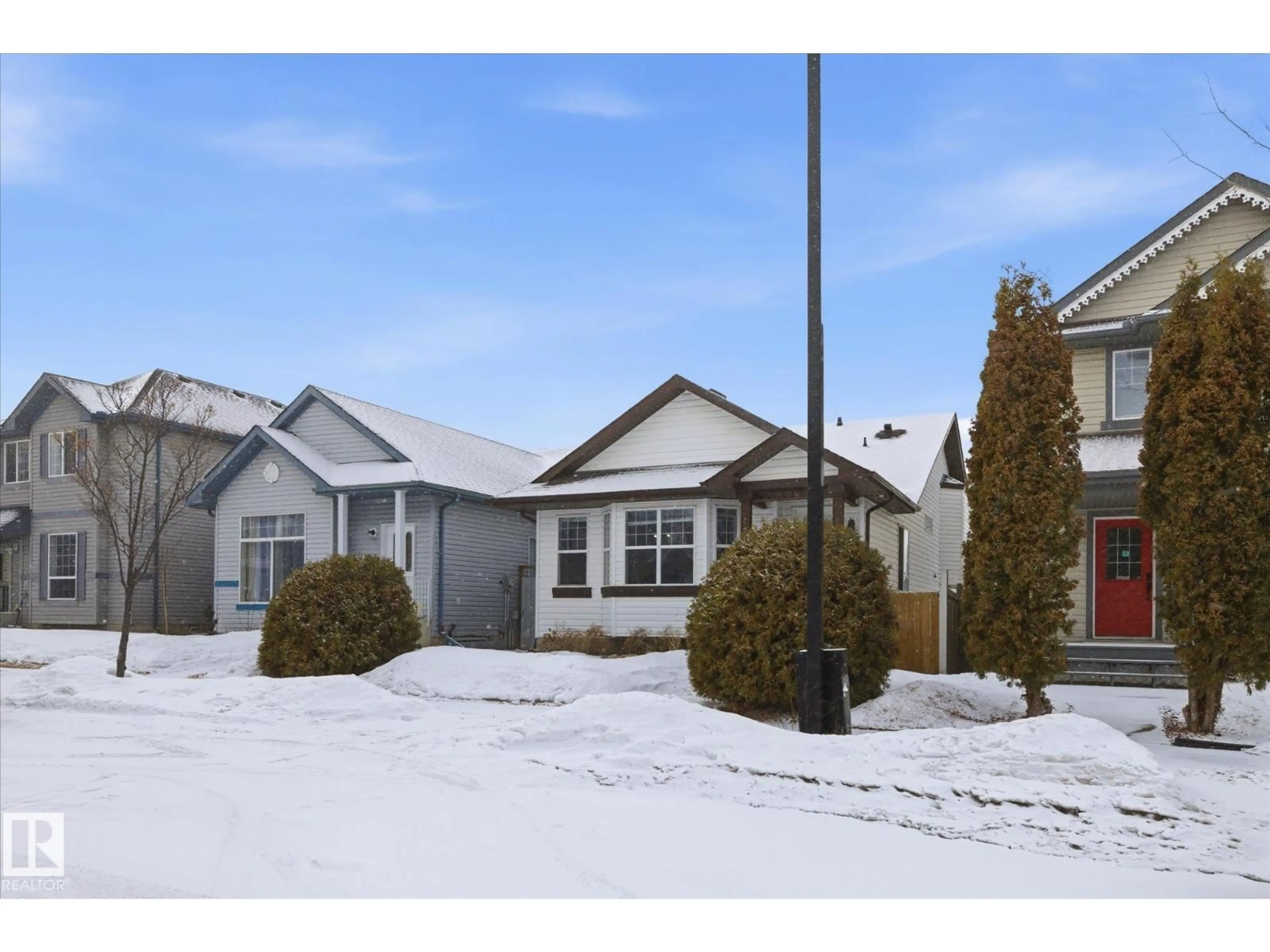 Home with vinyl exterior material, street for 2916 31 ST, Edmonton Alberta T6T1T9