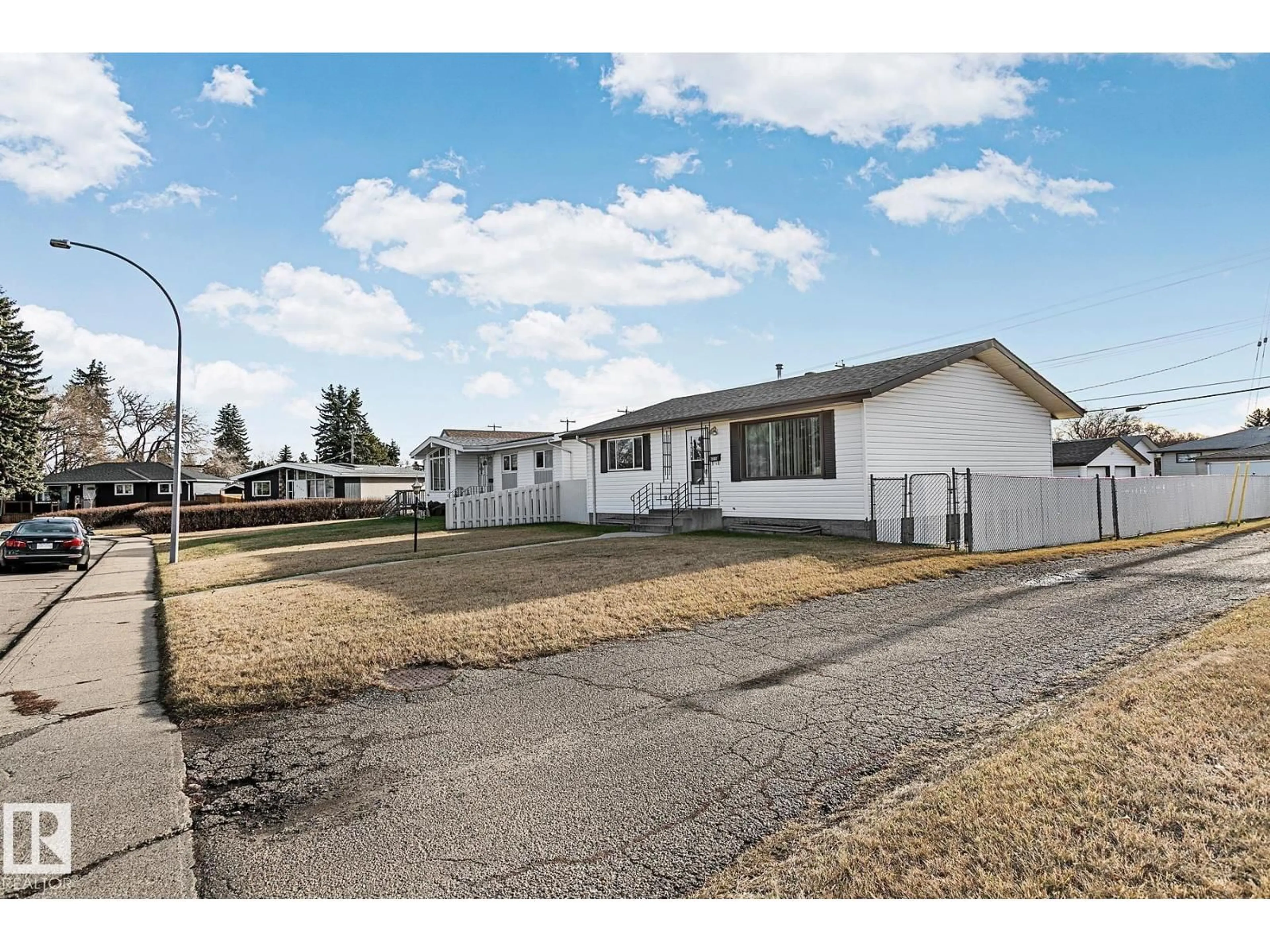 A pic from outside/outdoor area/front of a property/back of a property/a pic from drone, street for 6315 132A AV, Edmonton Alberta T5A0J9