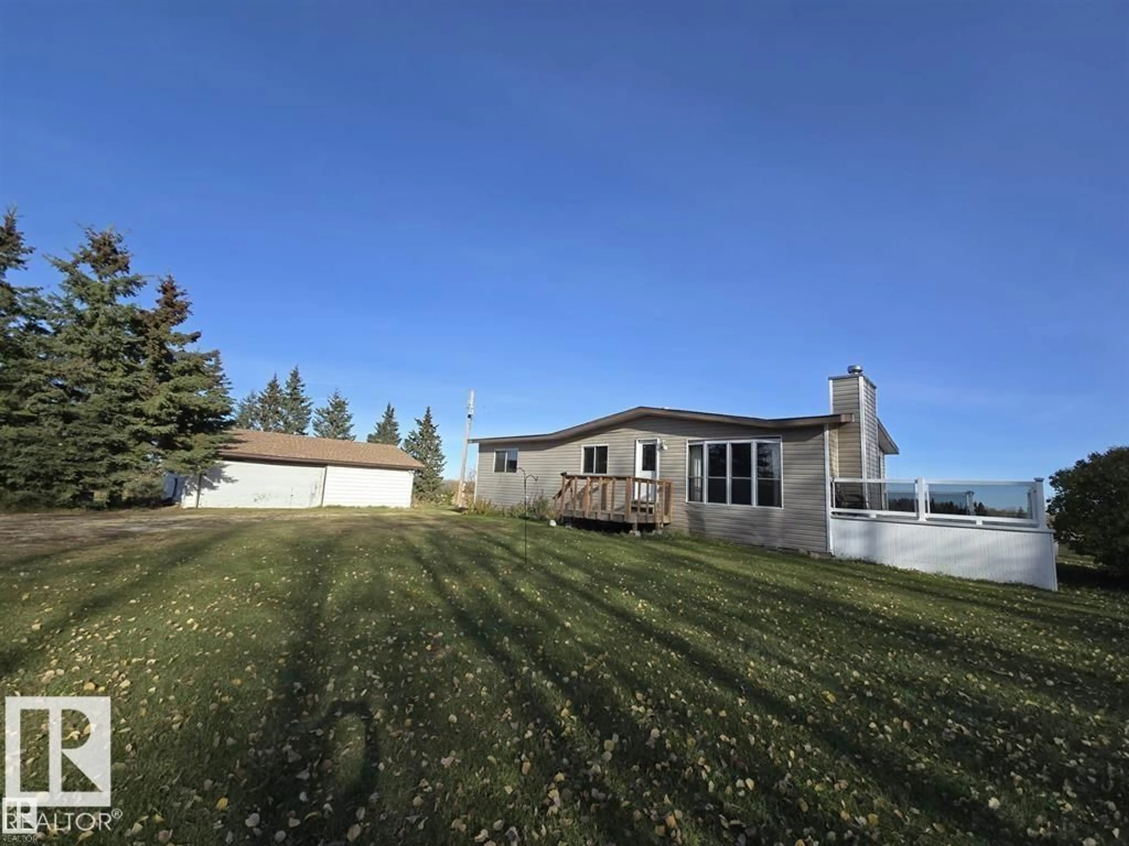 A pic from outside/outdoor area/front of a property/back of a property/a pic from drone, unknown for 465051 RGE ROAD 41, Rural Wetaskiwin County Alberta T0C2X0
