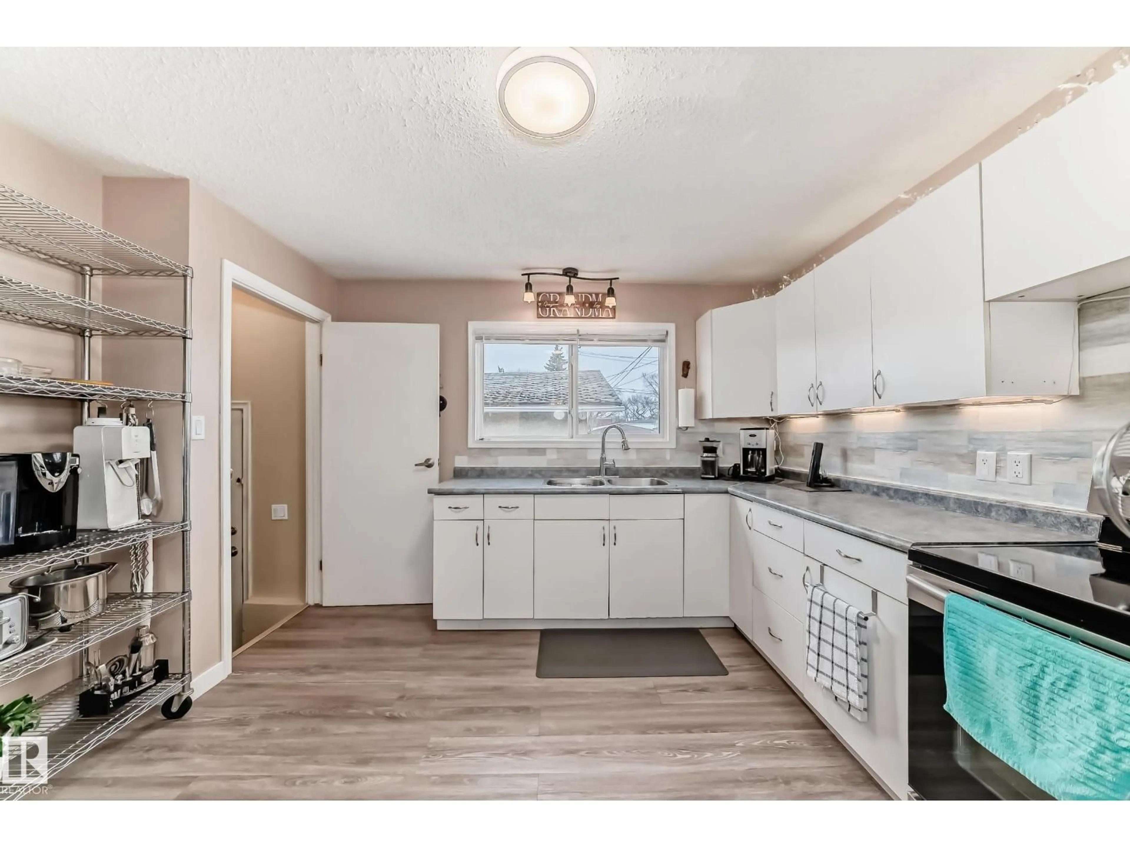 Open concept kitchen, unknown for 13519 118 AV, Edmonton Alberta T5L2L9