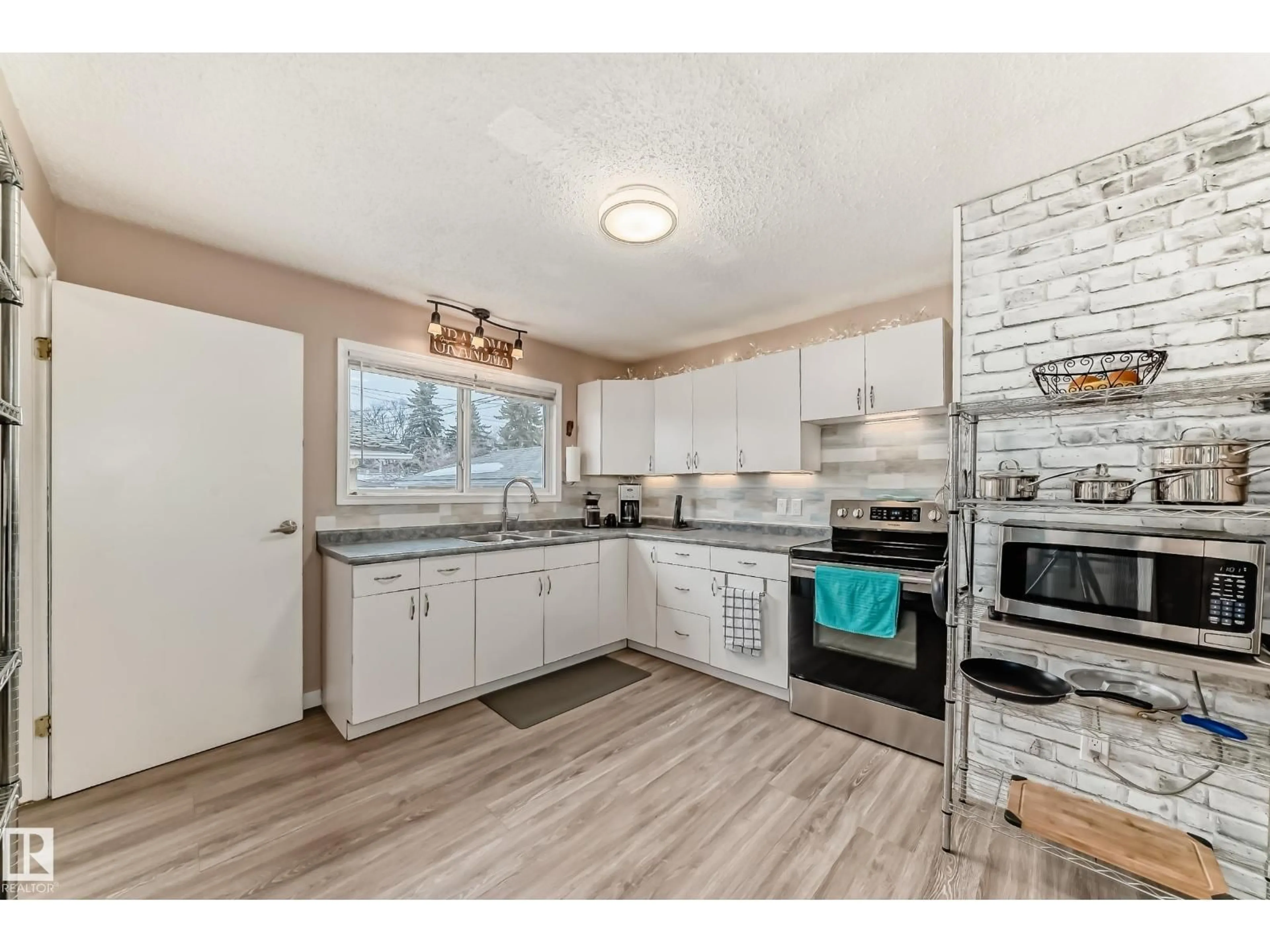 Open concept kitchen, unknown for 13519 118 AV, Edmonton Alberta T5L2L9