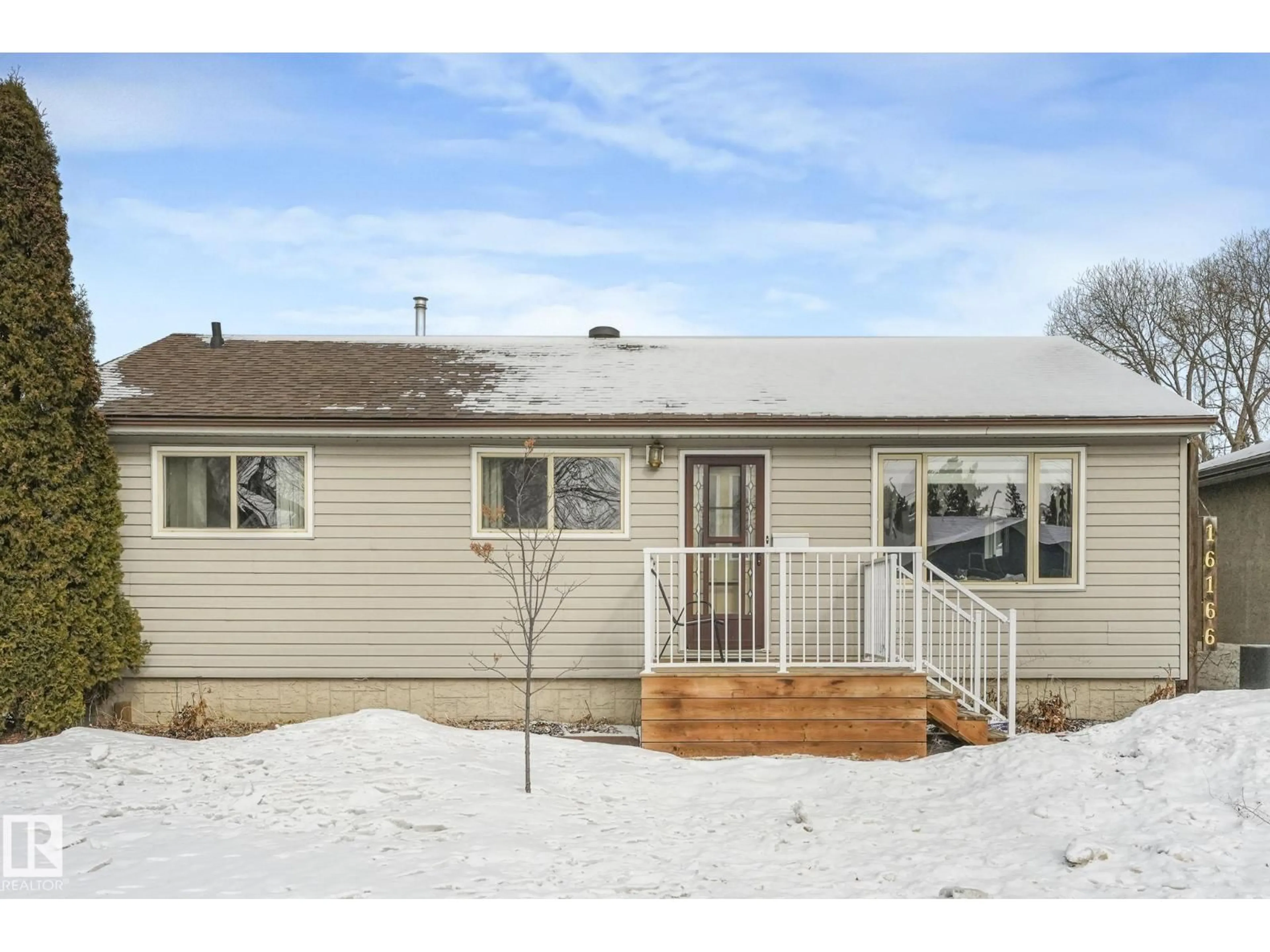 Home with vinyl exterior material, street for 16166 107A AV NW, Edmonton Alberta T5P4E1