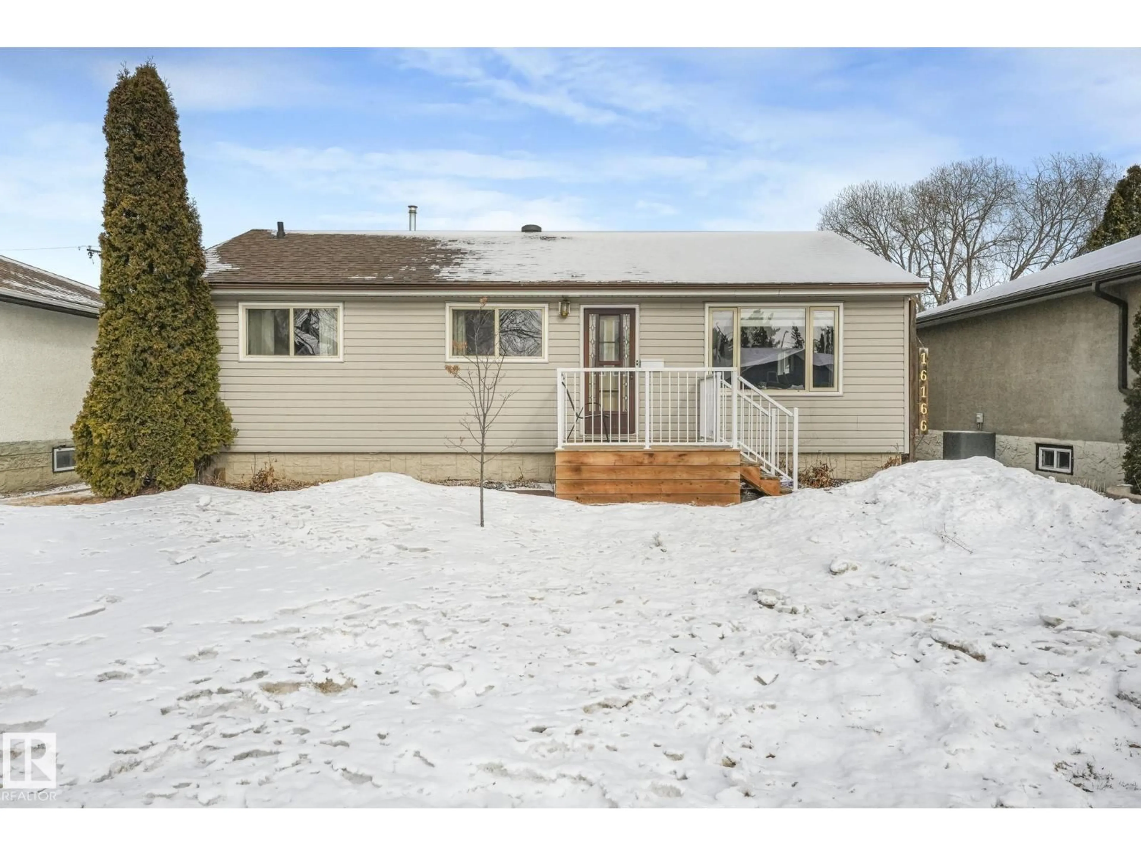 Home with vinyl exterior material, street for 16166 107A AV NW, Edmonton Alberta T5P4E1