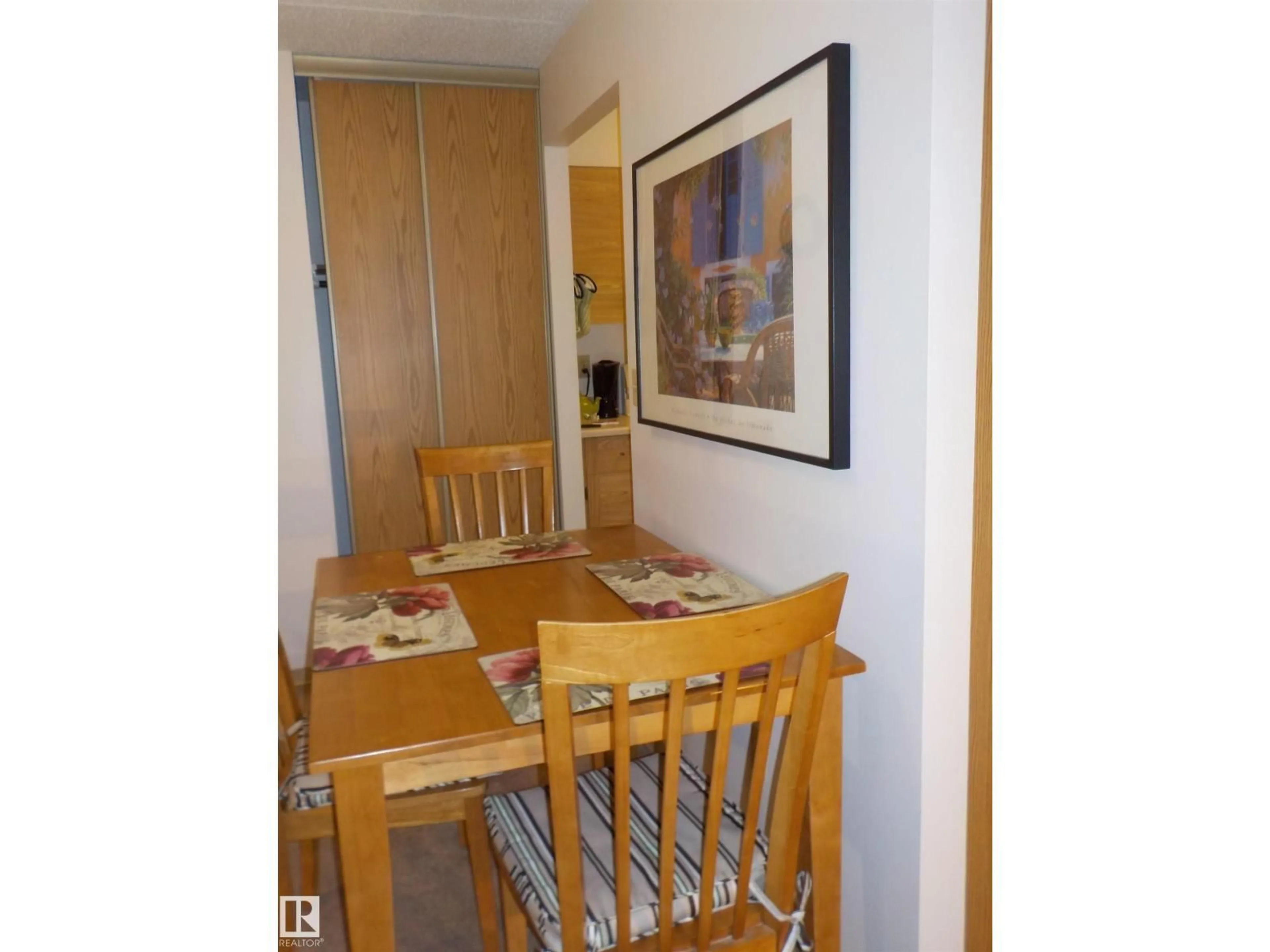 Dining room, wood/laminate floor for 207 9917 110 ST NW, Edmonton Alberta T5K2N4