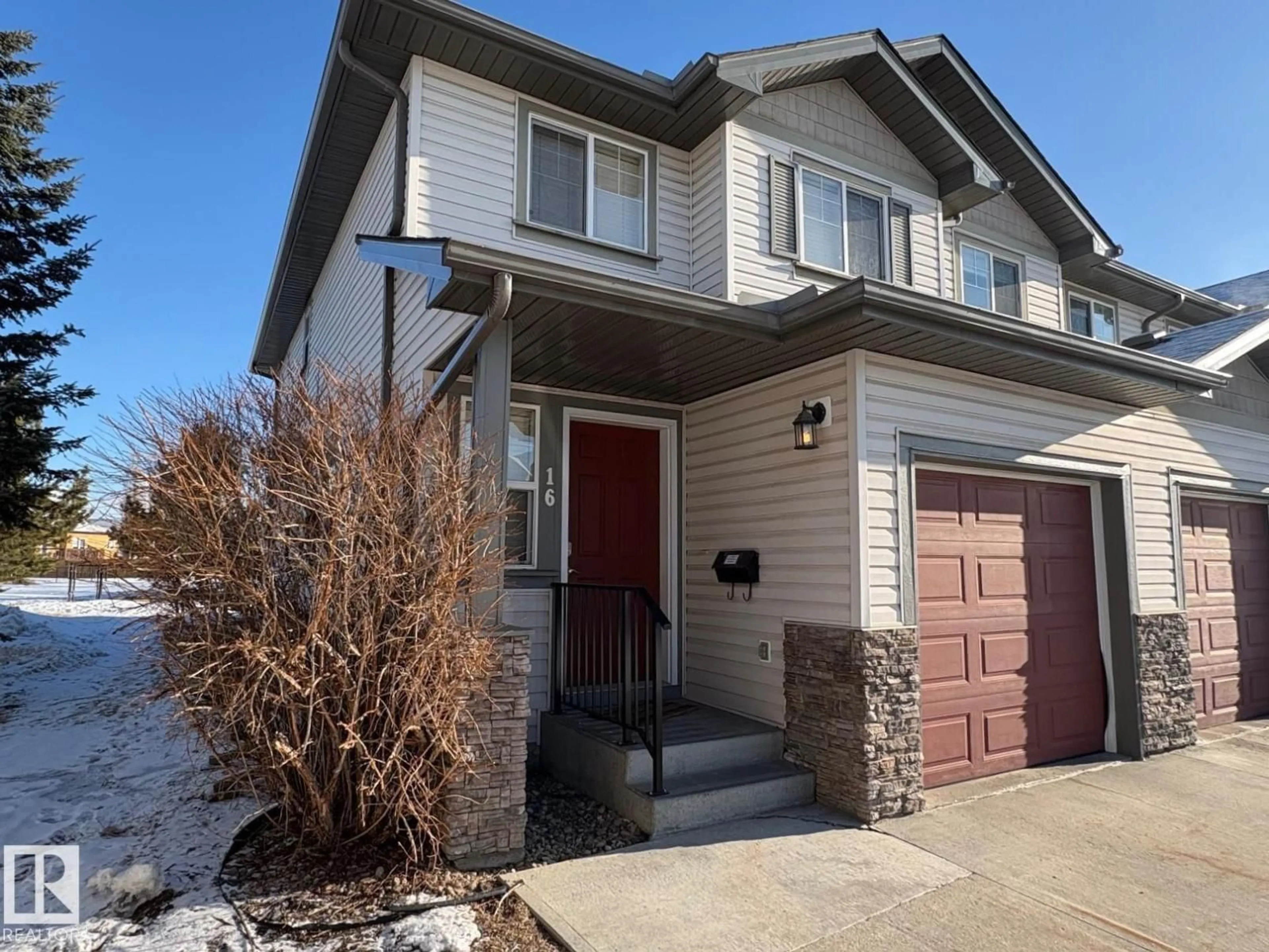 Home with vinyl exterior material, street for 16 - 2816 34 AV, Edmonton Alberta T6T2B4