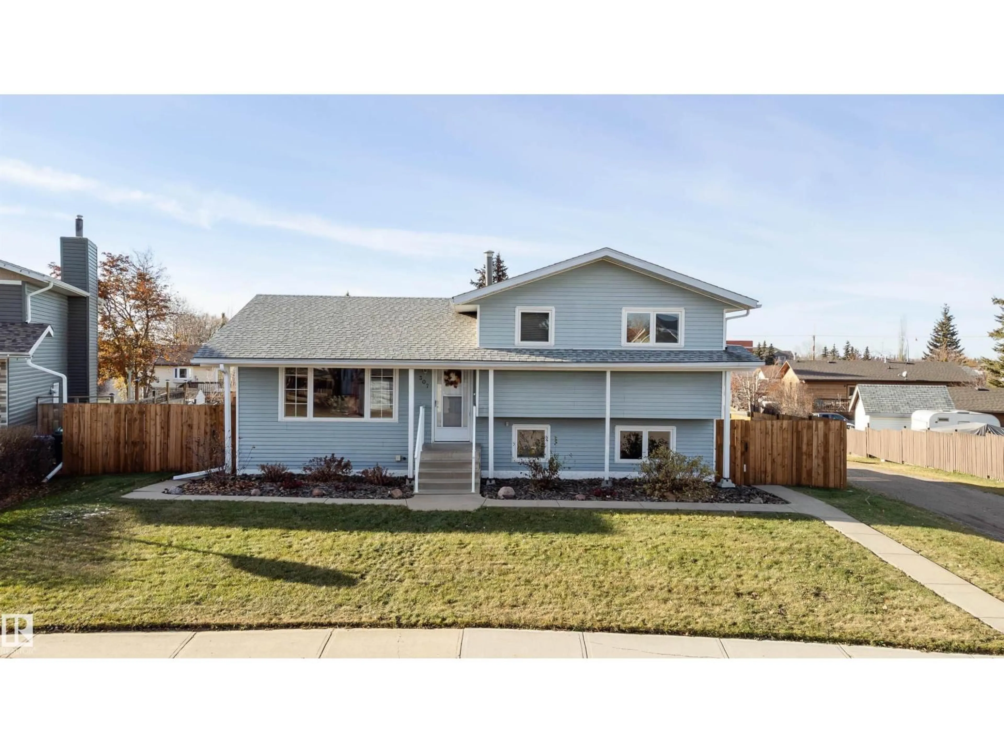 Home with vinyl exterior material, street for 307 21 ST, Cold Lake Alberta T9M1G1