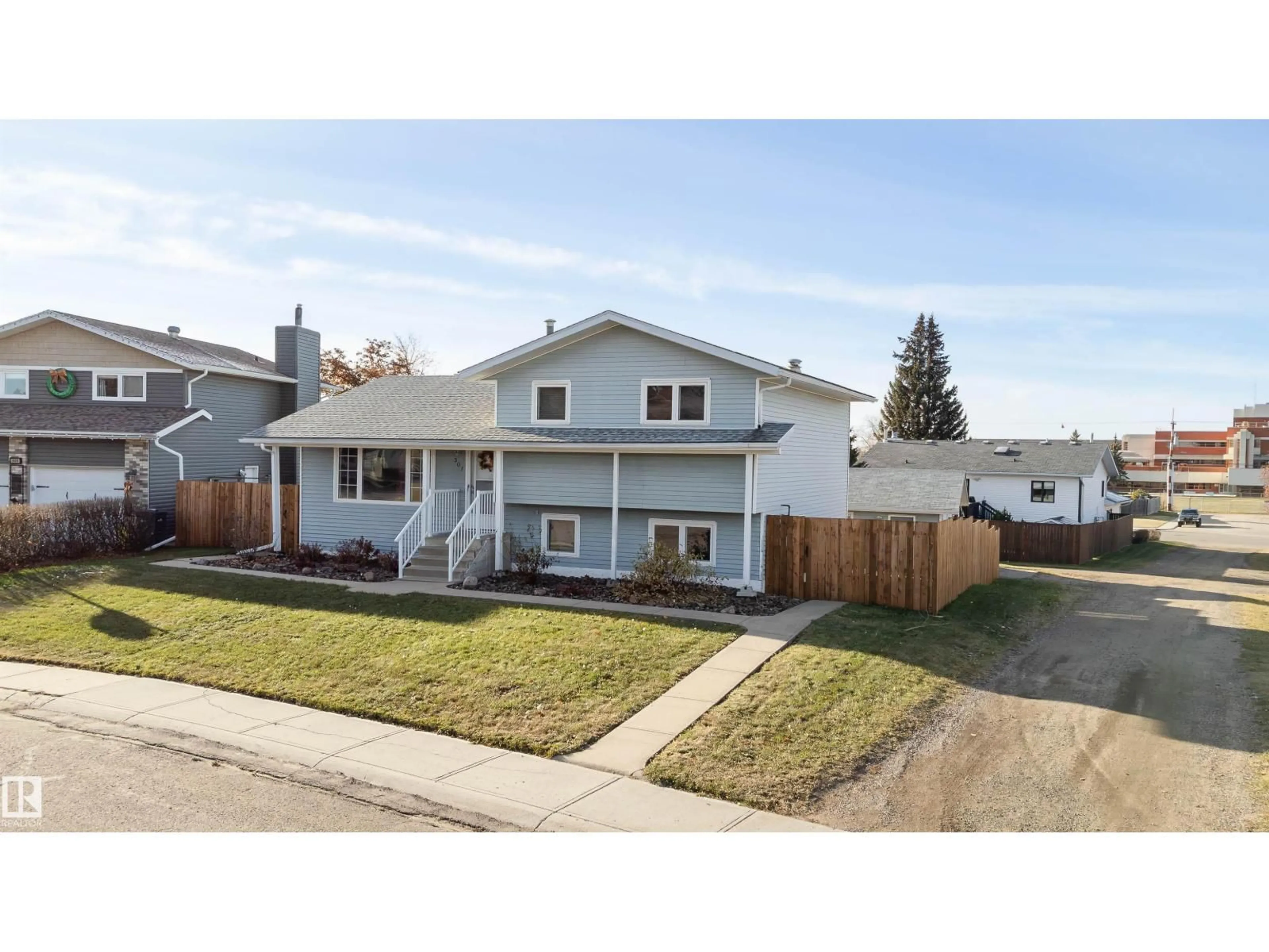 Home with vinyl exterior material, street for 307 21 ST, Cold Lake Alberta T9M1G1