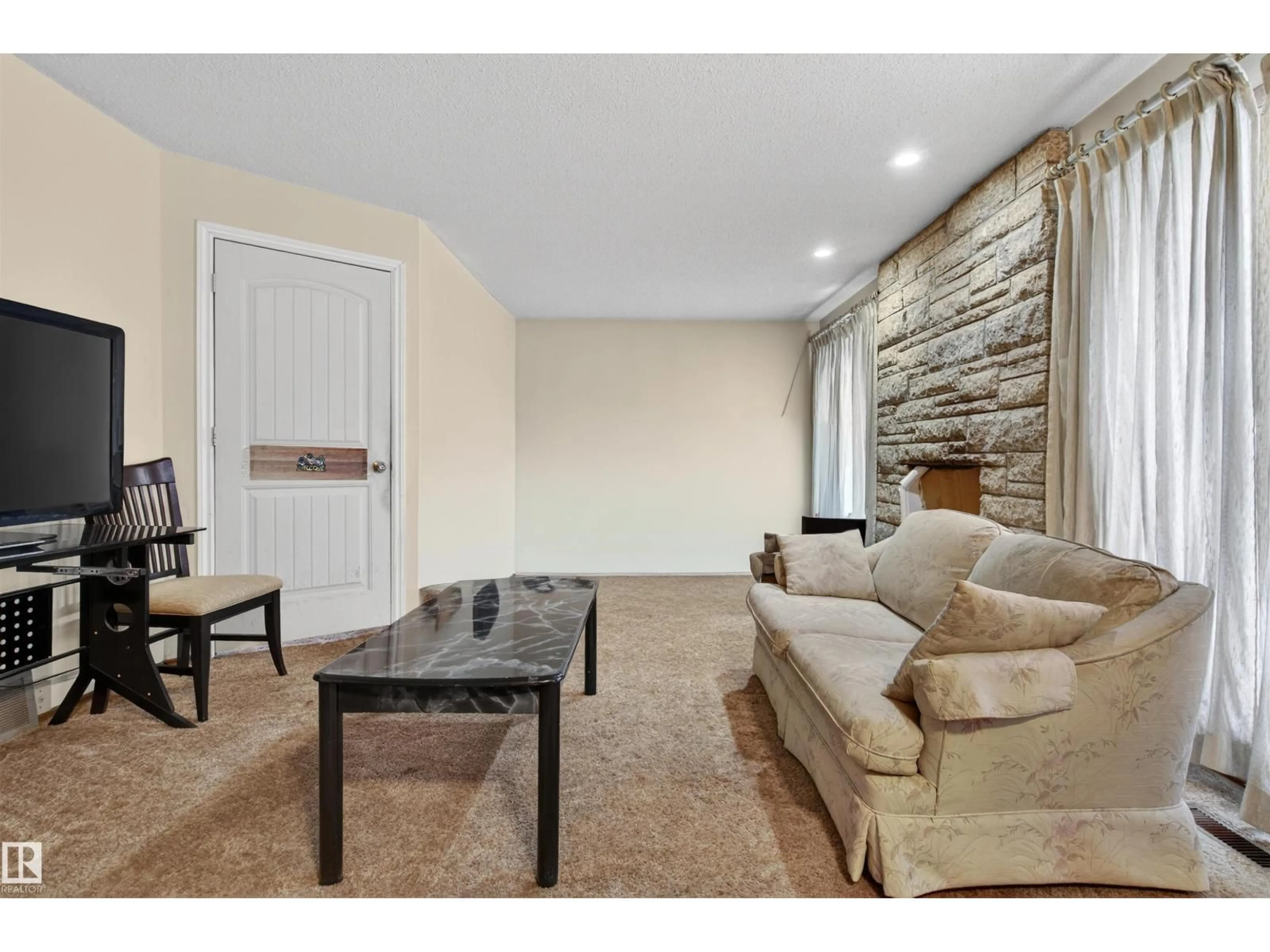 Living room with furniture, unknown for 4104 109 ST NW, Edmonton Alberta T6J2P9