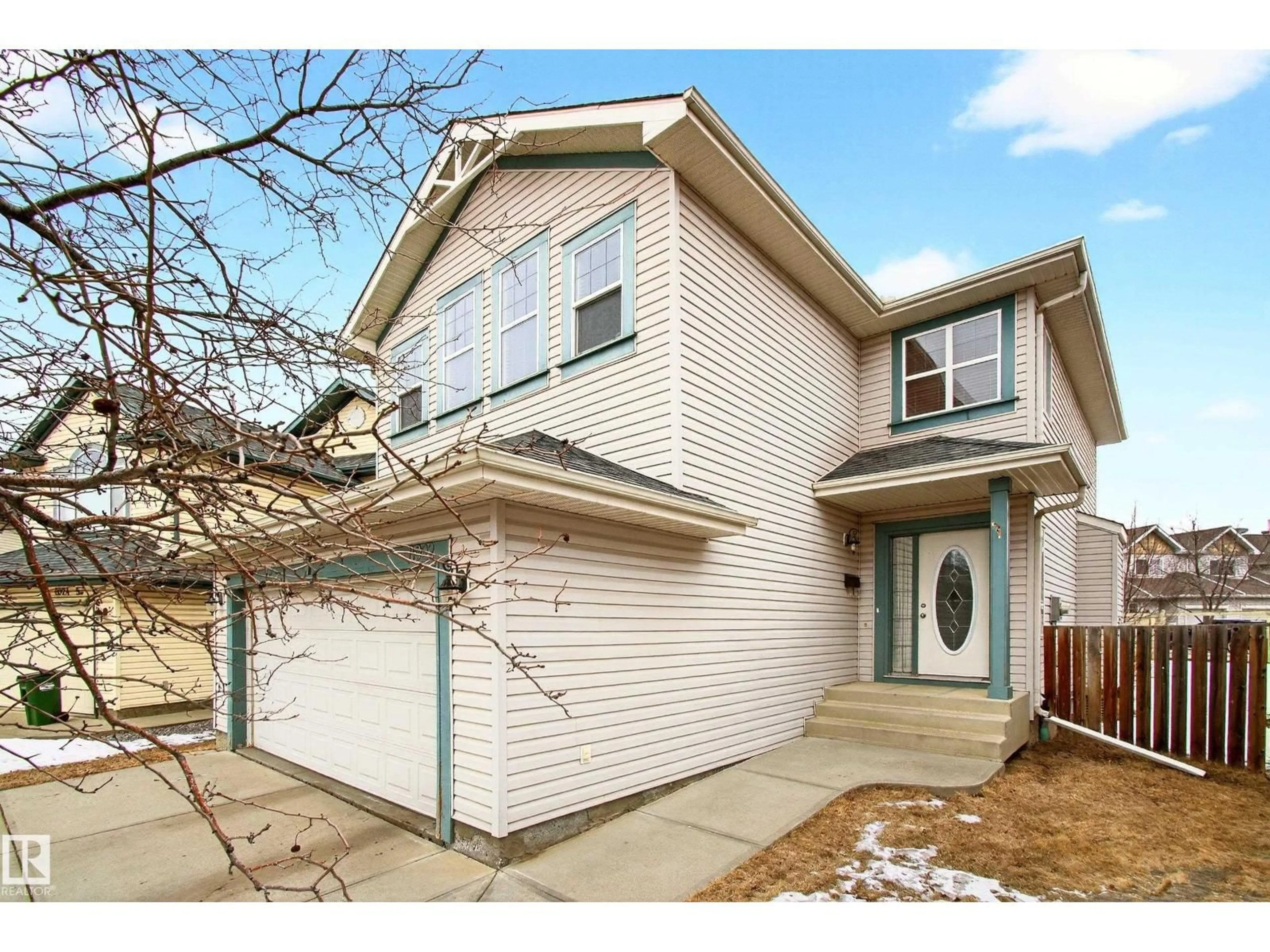 Home with vinyl exterior material, street for 8922 5 AV SW, Edmonton Alberta T6X1C9