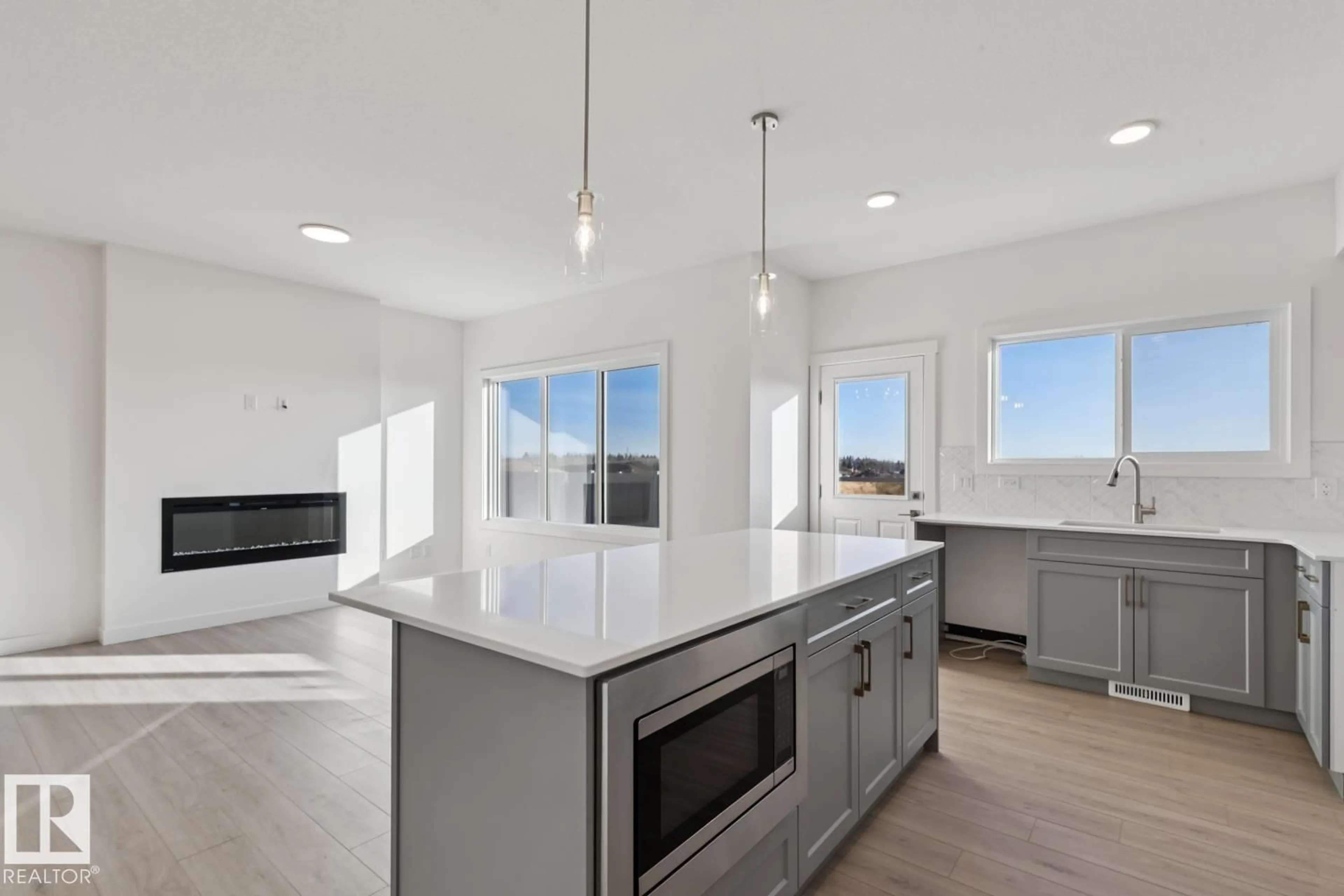 Open concept kitchen, unknown for 19115 20 AV, Edmonton Alberta T6M3E8
