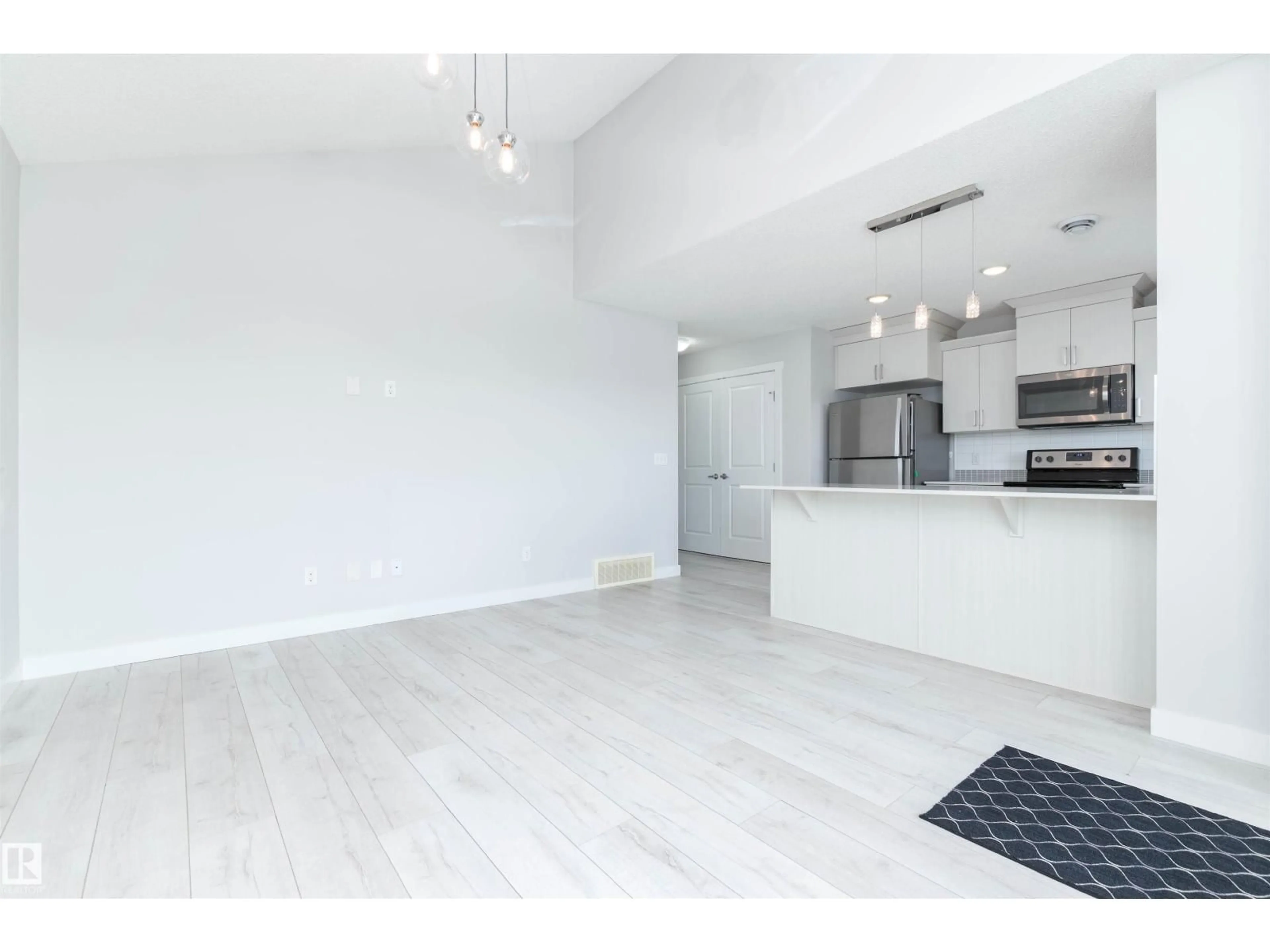 Open concept kitchen, unknown for #6 - 1203 163 ST, Edmonton Alberta T6W3X1