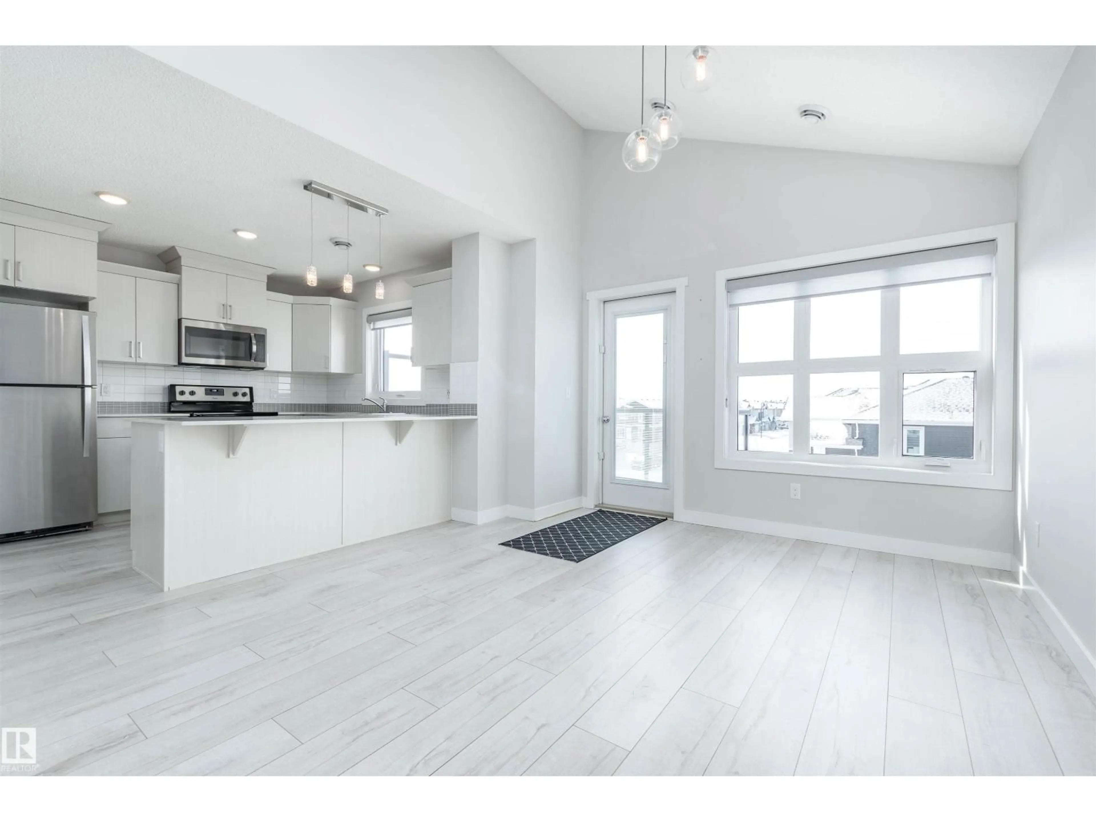 Open concept kitchen, unknown for #6 - 1203 163 ST, Edmonton Alberta T6W3X1