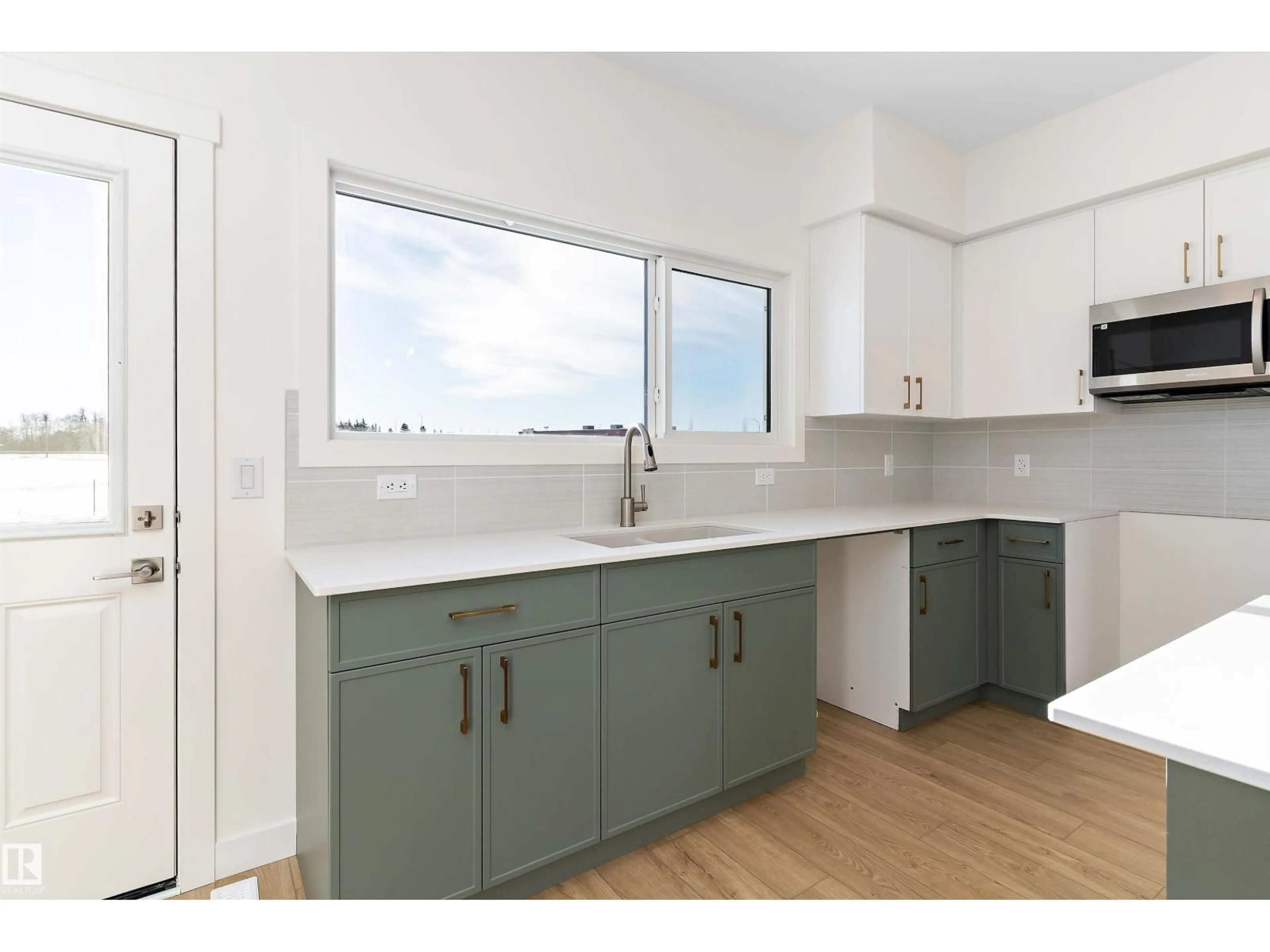 Open concept kitchen, unknown for NW - 6234 175A AV, Edmonton Alberta T5Y4H3