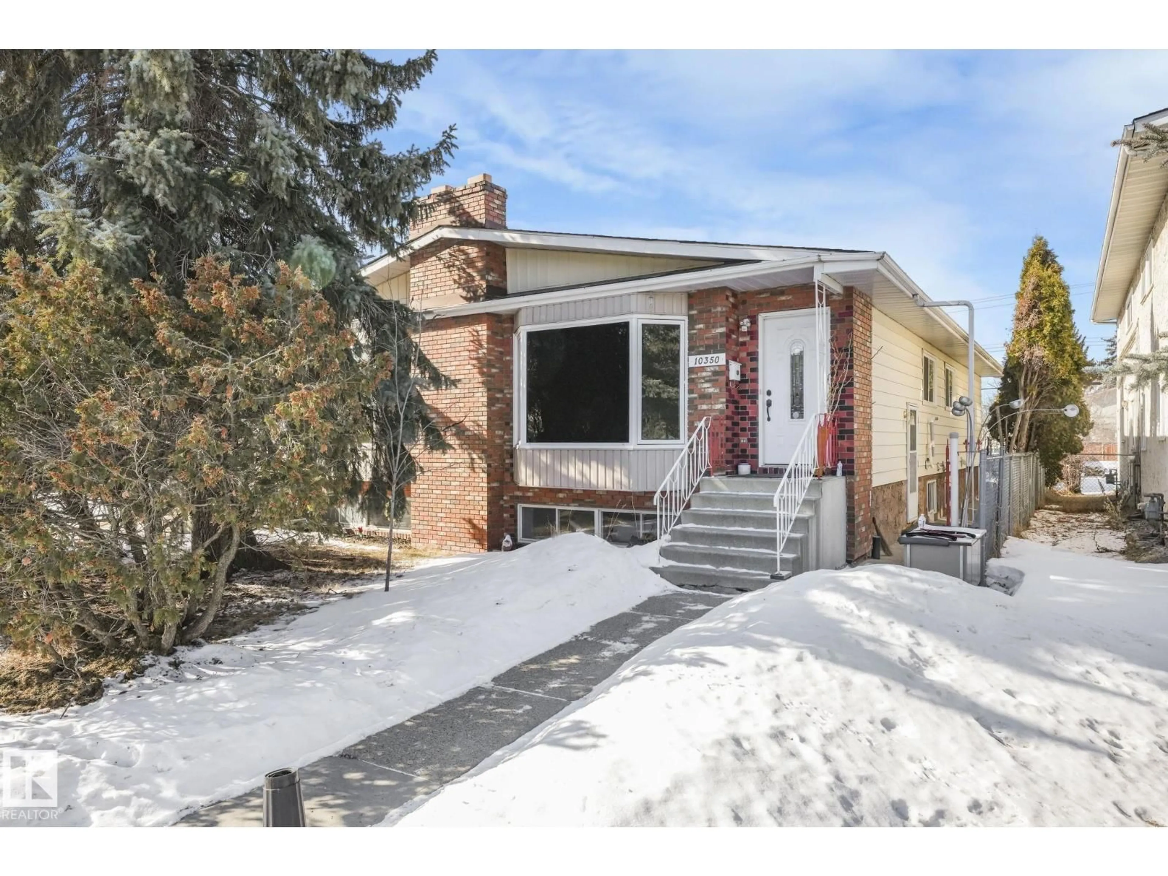 Home with brick exterior material, street for NW - 10350 154 ST, Edmonton Alberta T5P2H6