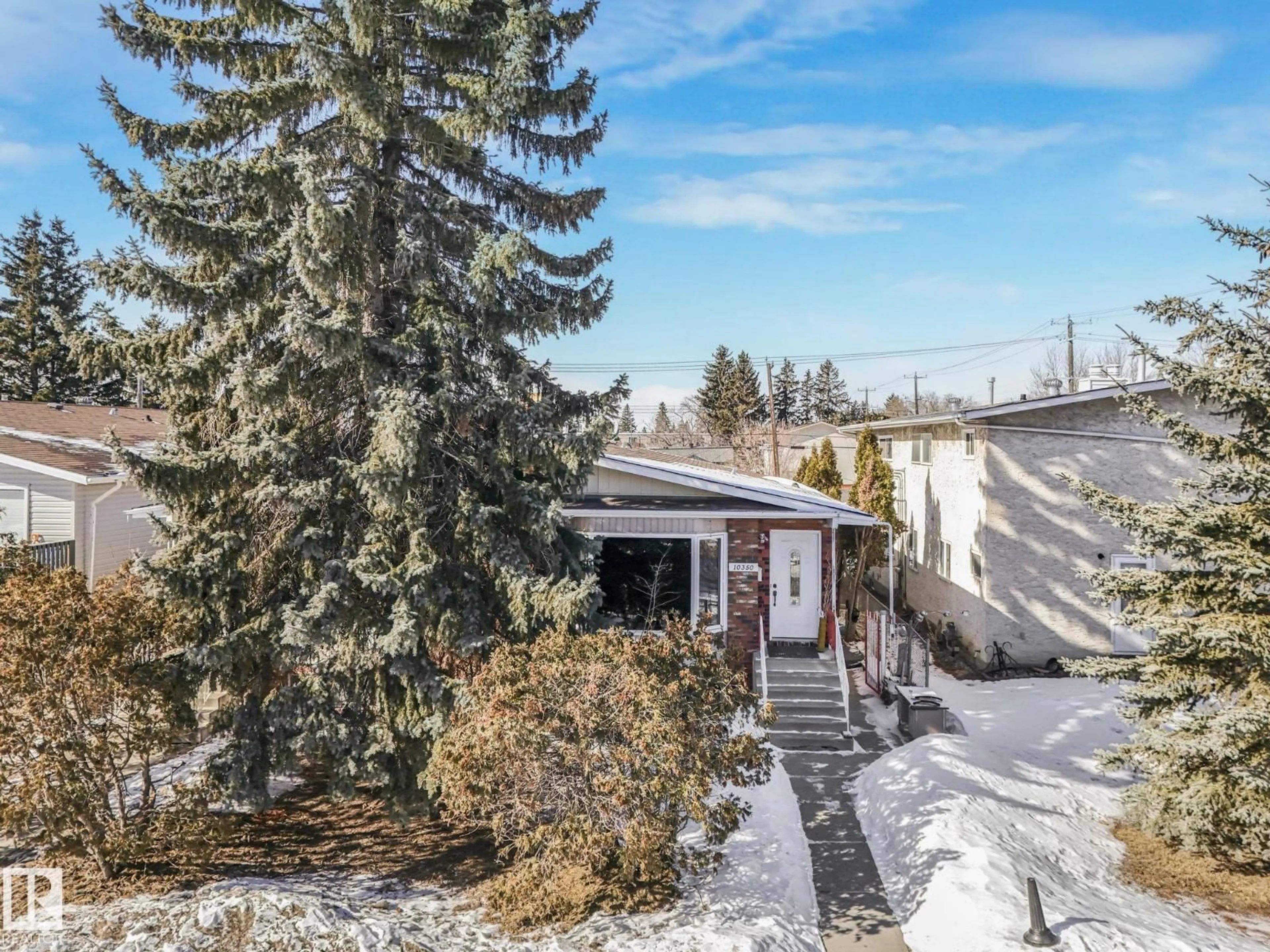 A pic from outside/outdoor area/front of a property/back of a property/a pic from drone, unknown for NW - 10350 154 ST, Edmonton Alberta T5P2H6