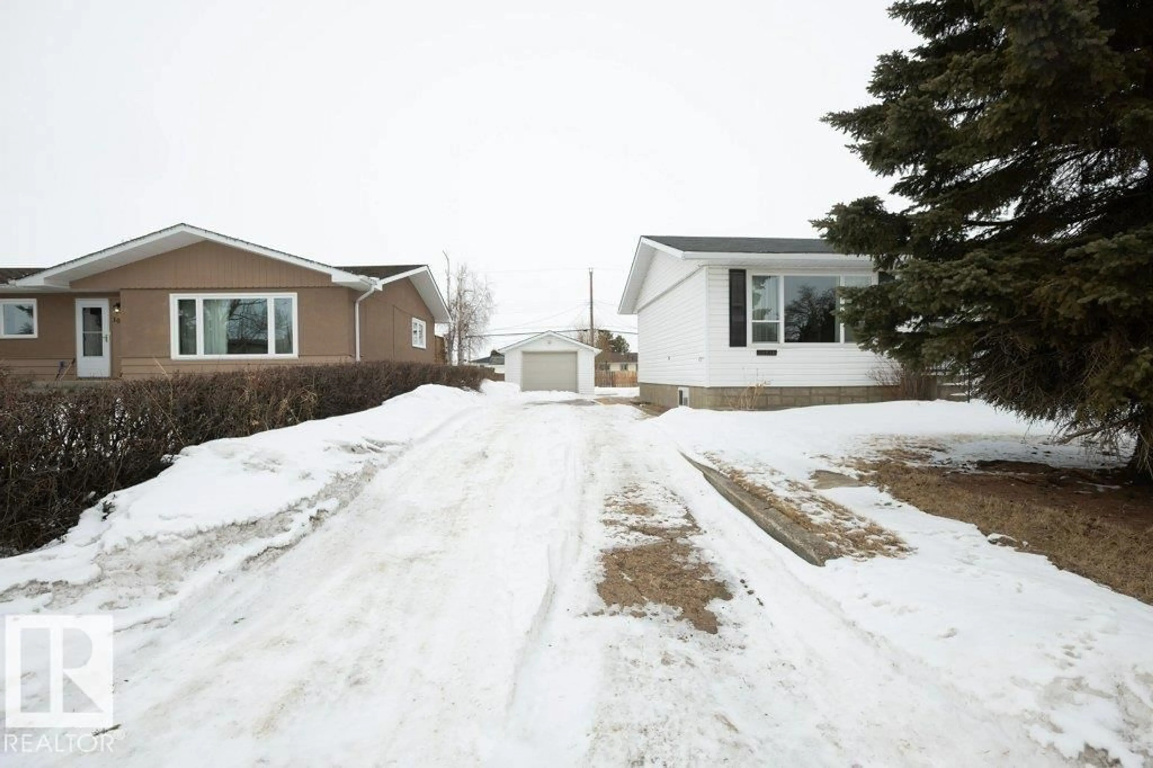 A pic from outside/outdoor area/front of a property/back of a property/a pic from drone, street for 10516 104 ST, Westlock Alberta T7P1M1