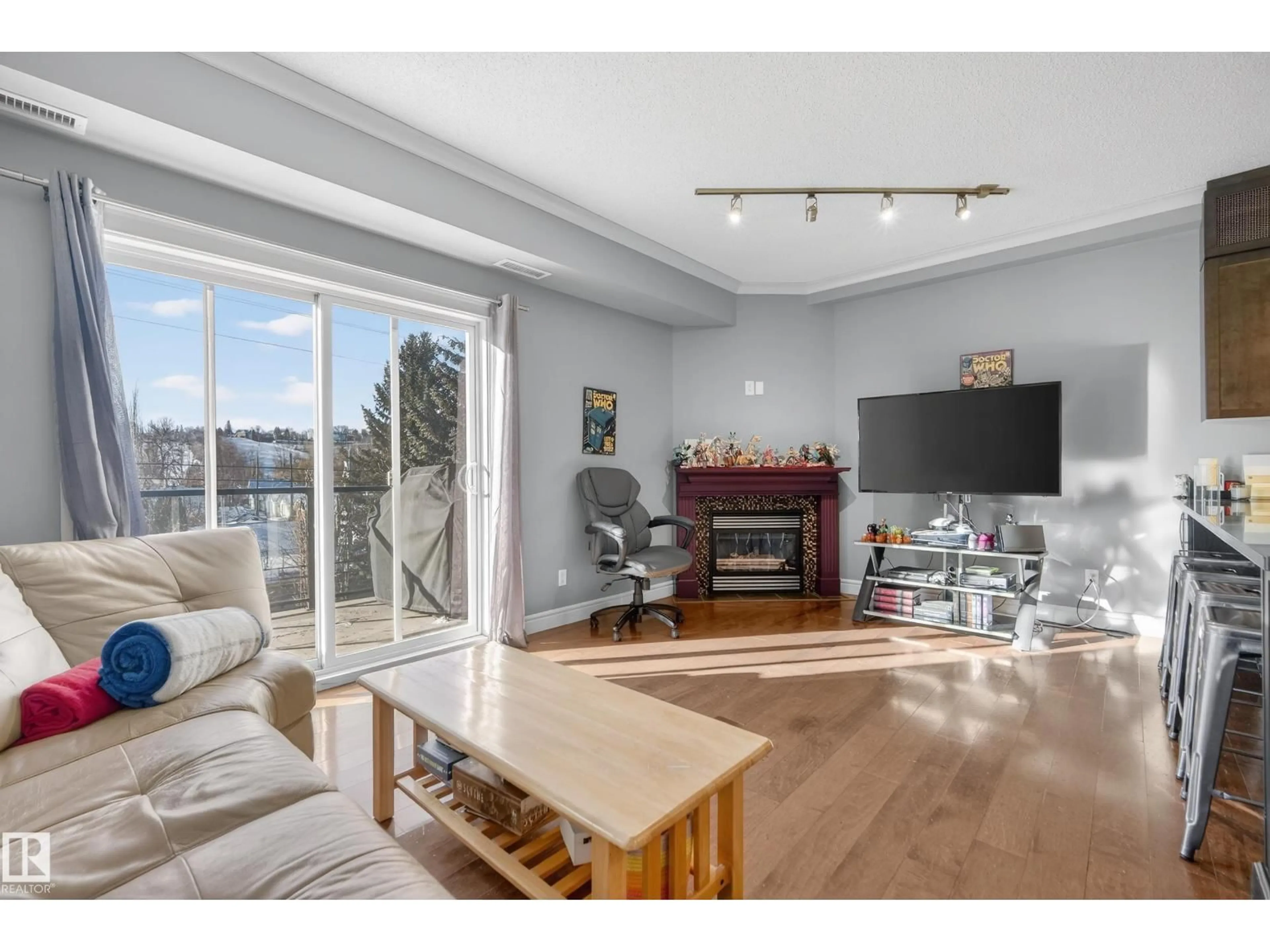 Living room with furniture, unknown for #307 - 9750 94 ST, Edmonton Alberta T6C2E3