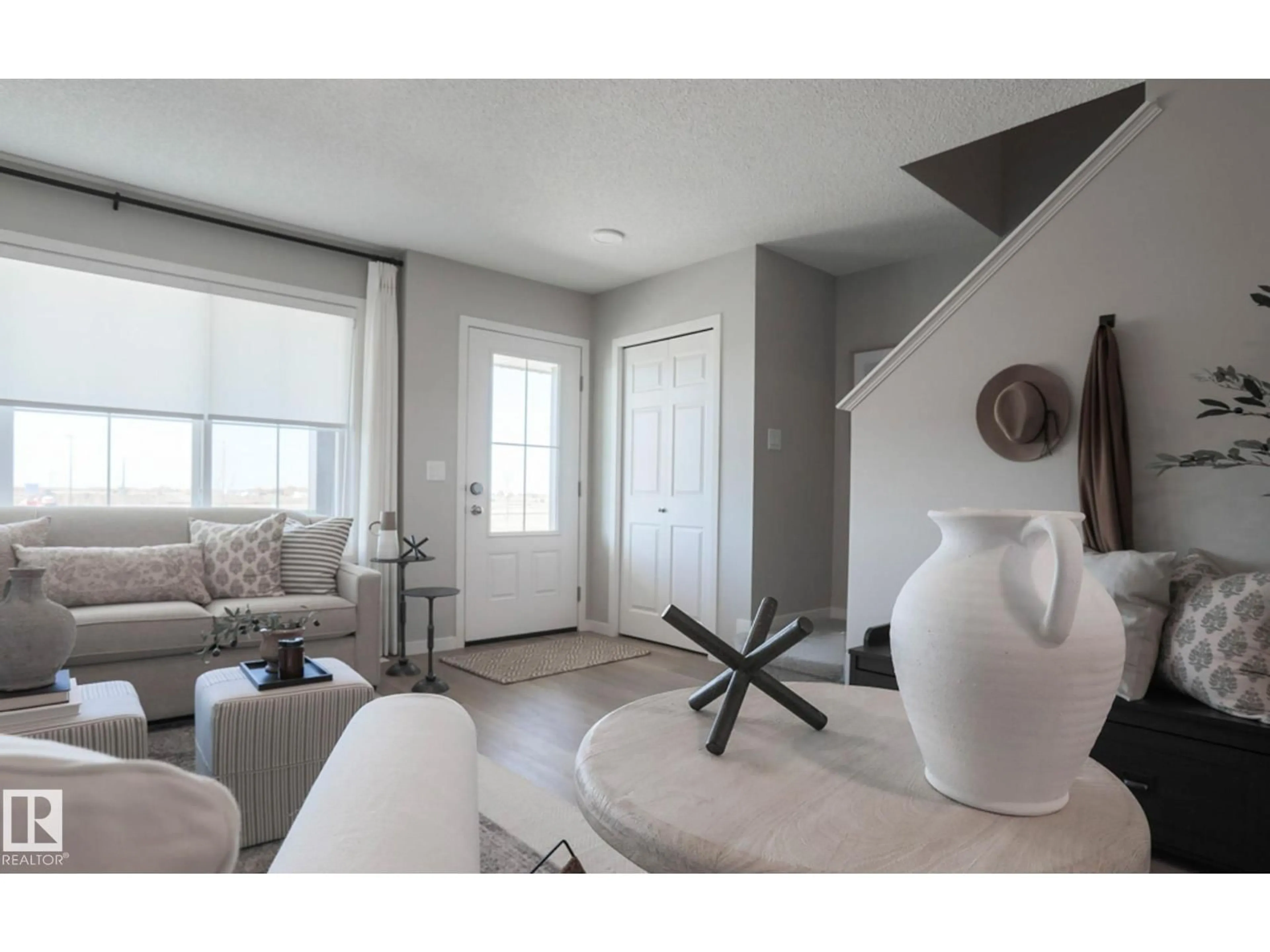 Living room with furniture, unknown for 143 SERENO LN, Fort Saskatchewan Alberta T8L0Z9