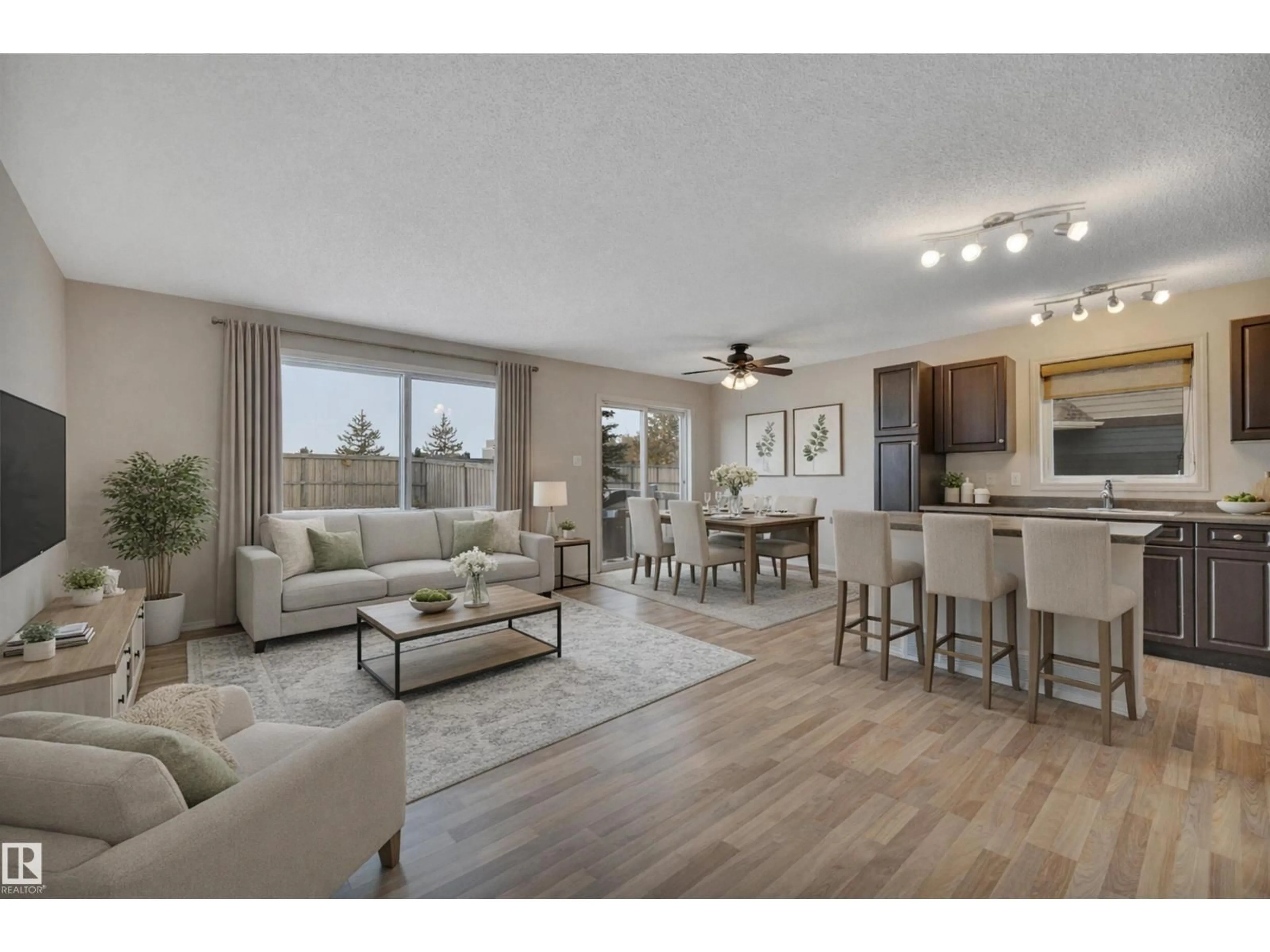 Living room with furniture, wood/laminate floor for 178 KEYSTONE CR, Leduc Alberta T9E0J5