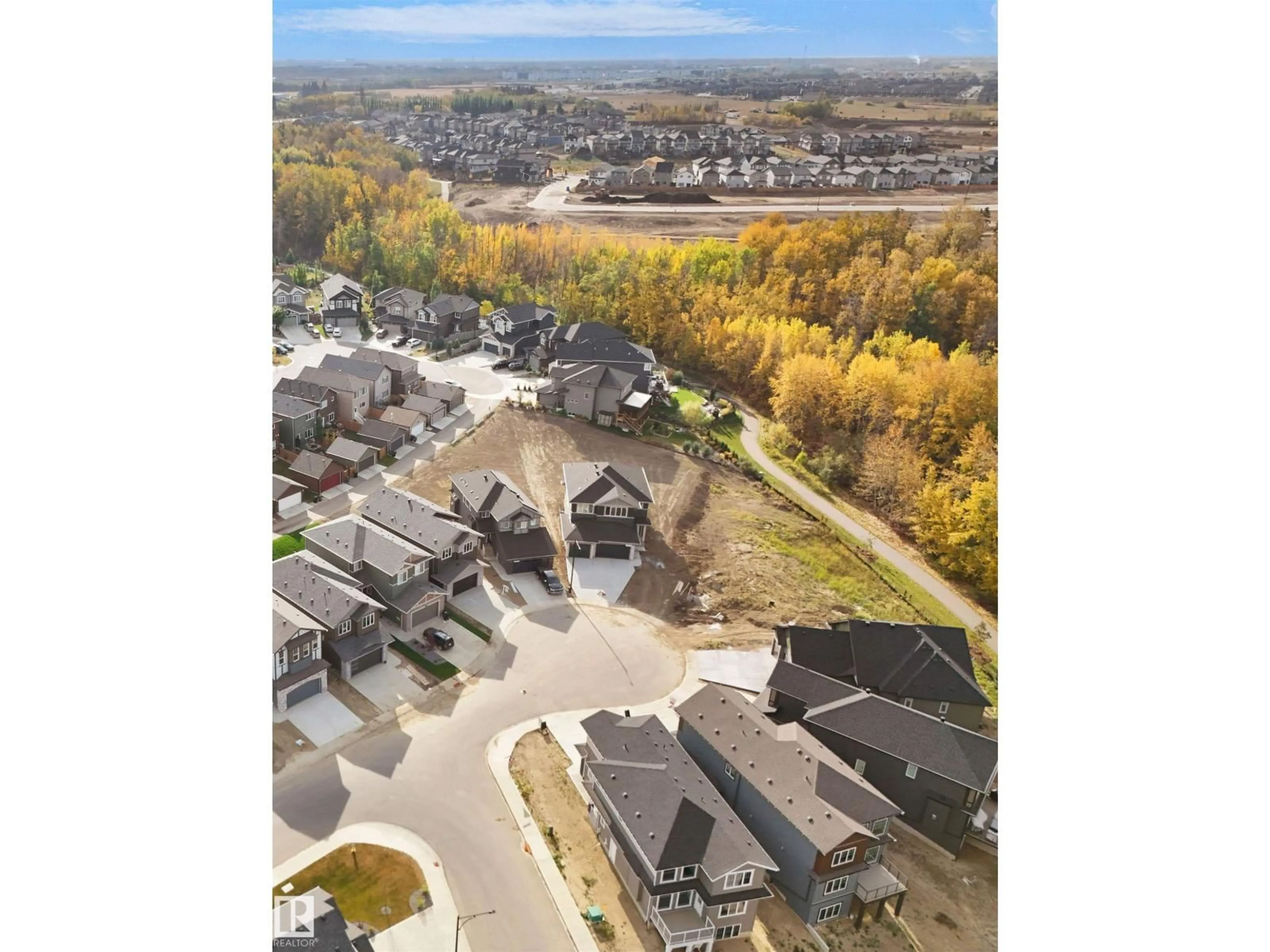 A pic from outside/outdoor area/front of a property/back of a property/a pic from drone, unknown for 1127 GYRFALCON CR, Edmonton Alberta T5S0S5