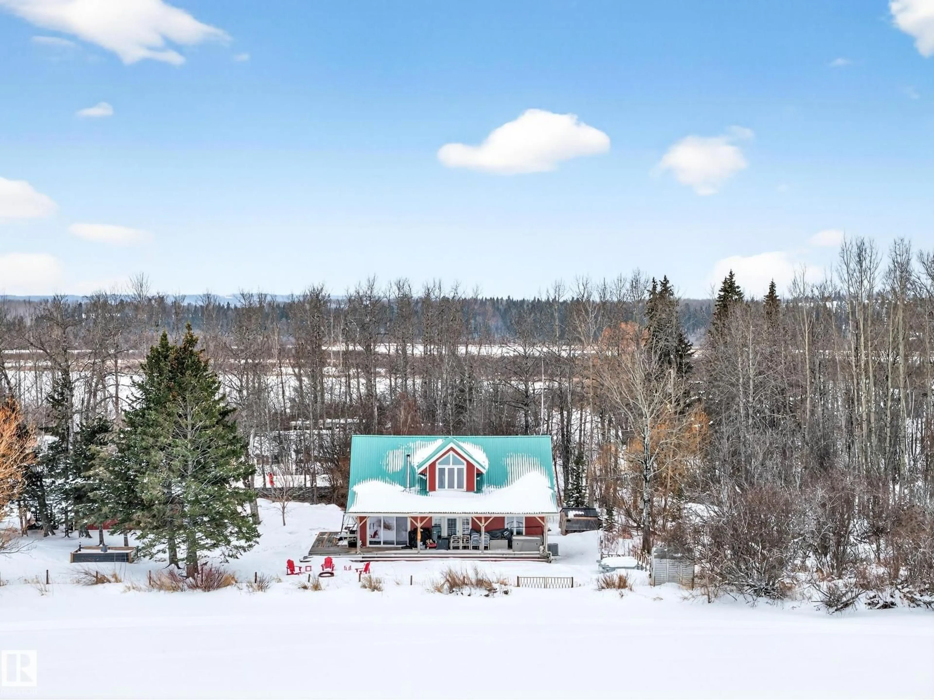 A pic from outside/outdoor area/front of a property/back of a property/a pic from drone, mountain view for 210 LAKESHORE DR, Rural Wetaskiwin County Alberta T0C0T0