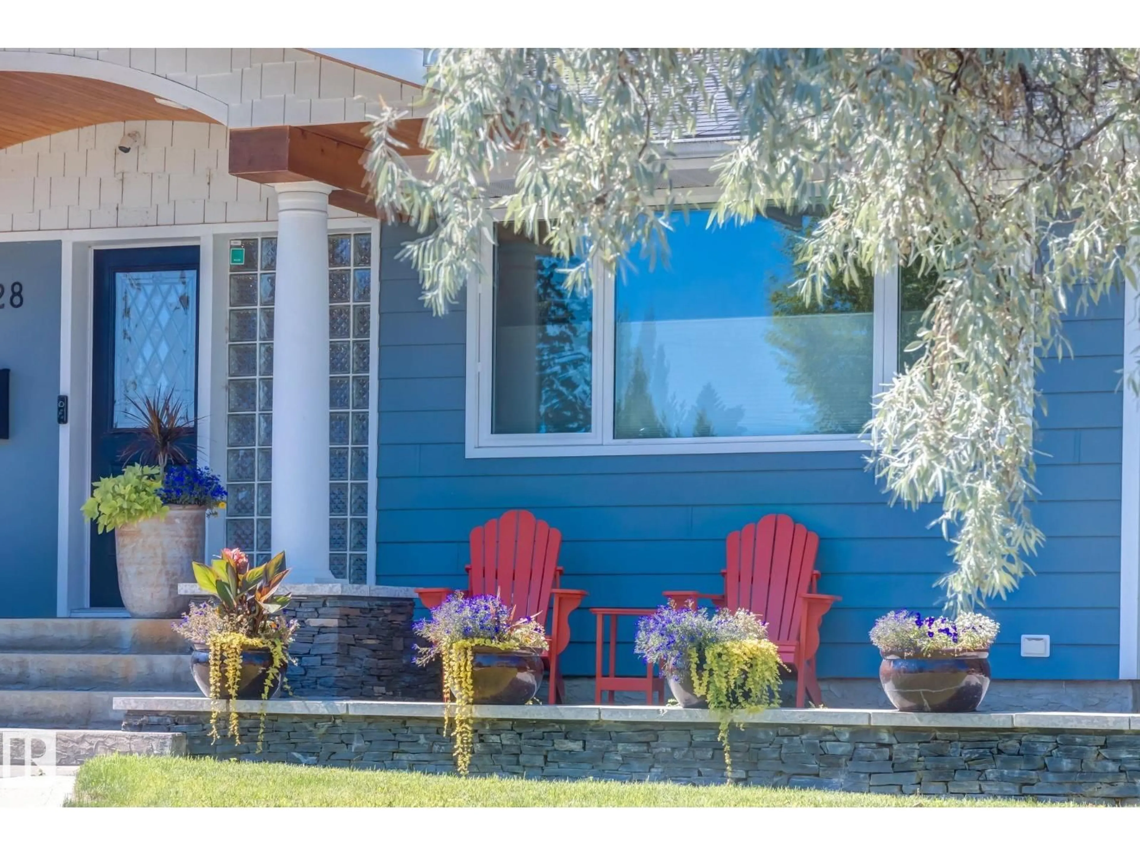 Home with vinyl exterior material, street for 9728 141 ST, Edmonton Alberta T5N2R2