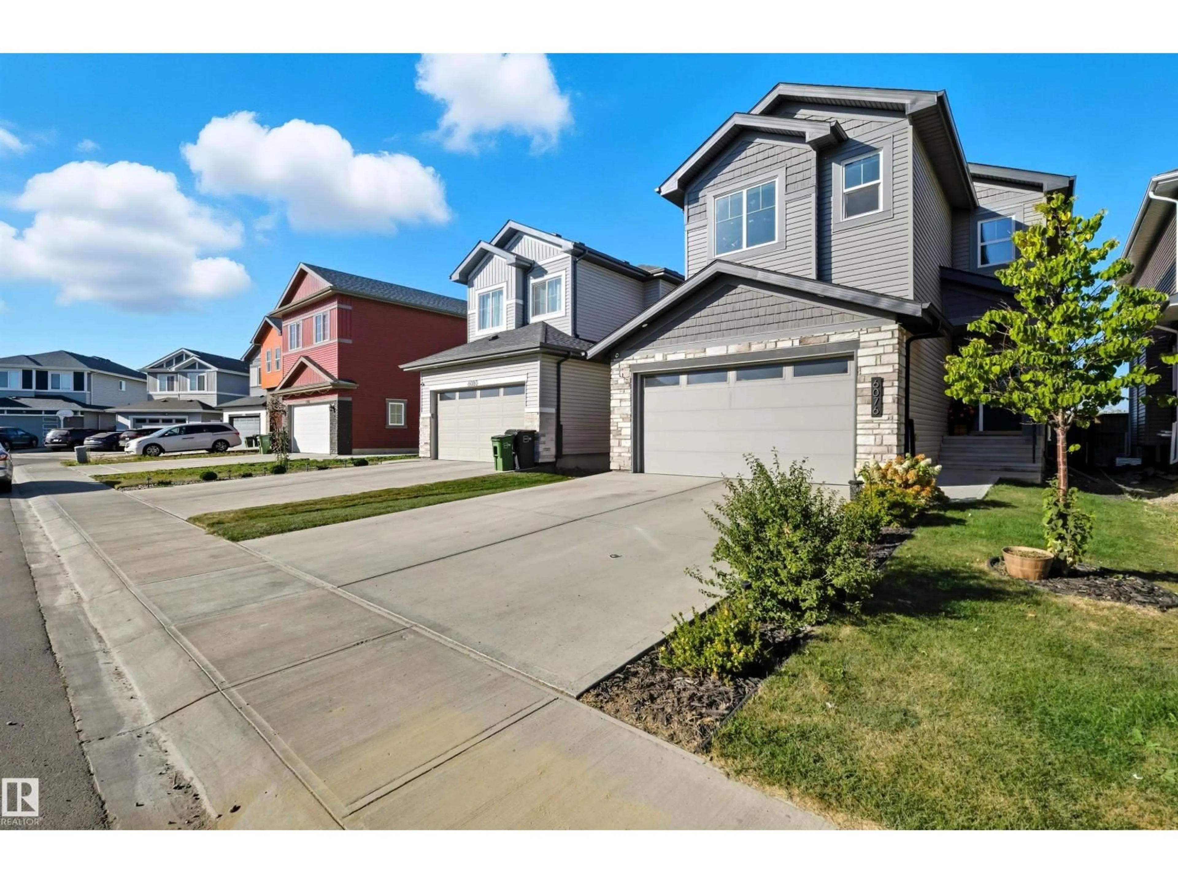 A pic from outside/outdoor area/front of a property/back of a property/a pic from drone, street for 6076 180 AV, Edmonton Alberta T5Y3X1