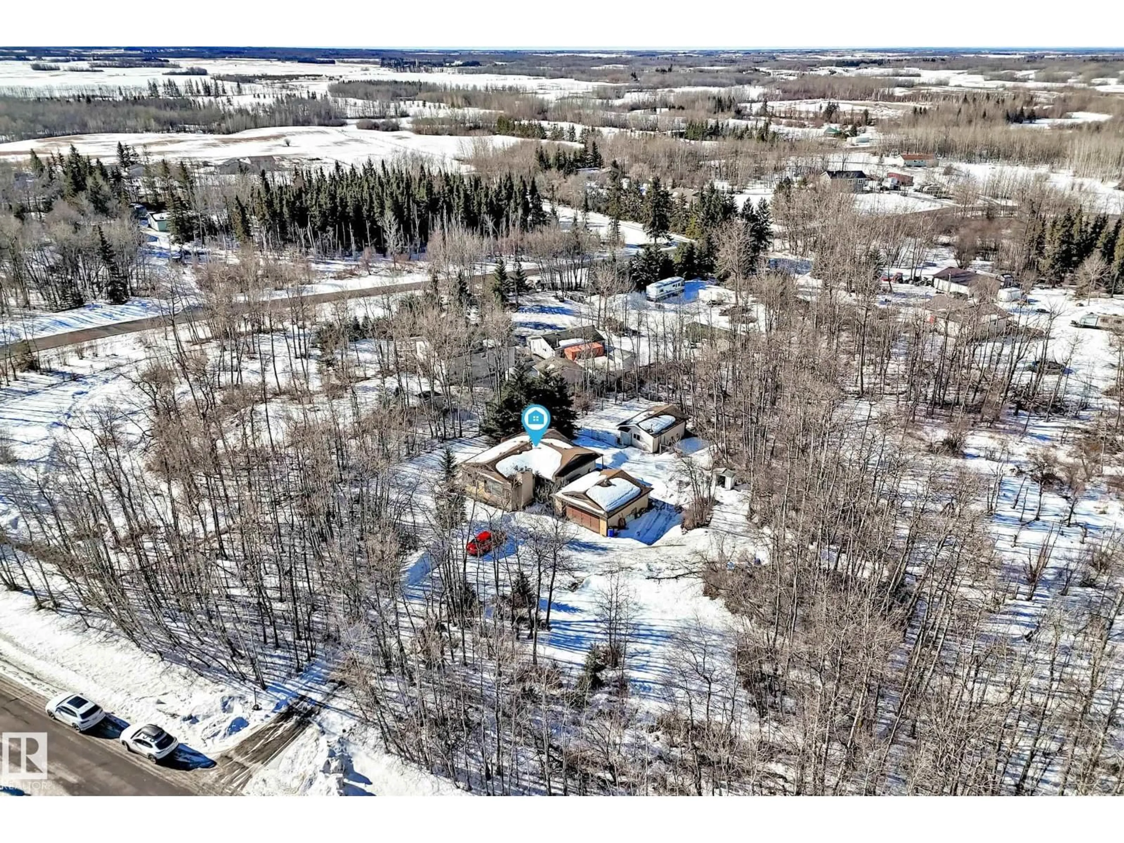A pic from outside/outdoor area/front of a property/back of a property/a pic from drone, unknown for 100 23016 TWP RD 504, Rural Leduc County Alberta T0B3M1