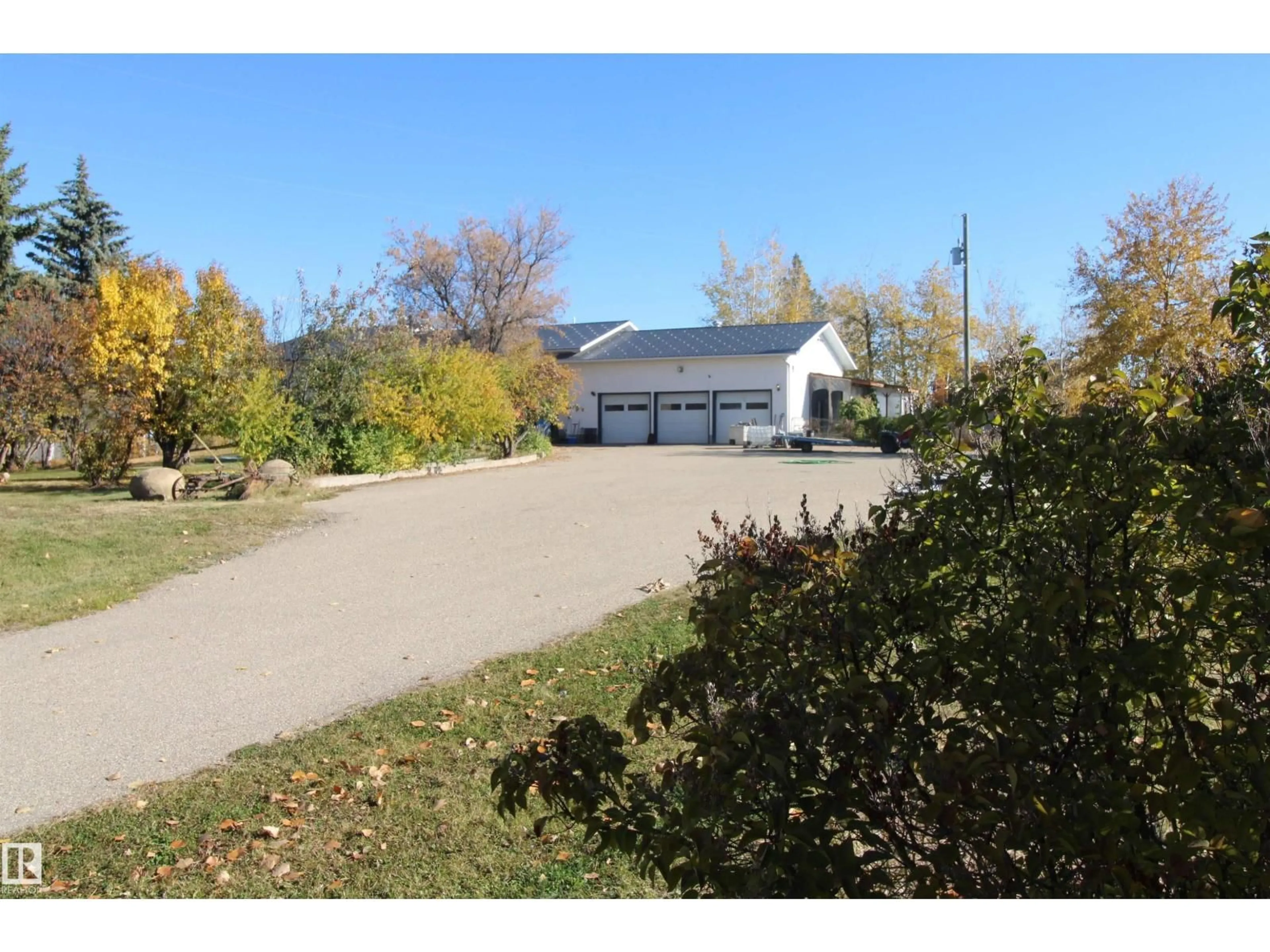 A pic from outside/outdoor area/front of a property/back of a property/a pic from drone, street for 53021 RGE ROAD 73, Rural Parkland County Alberta T0E0S0