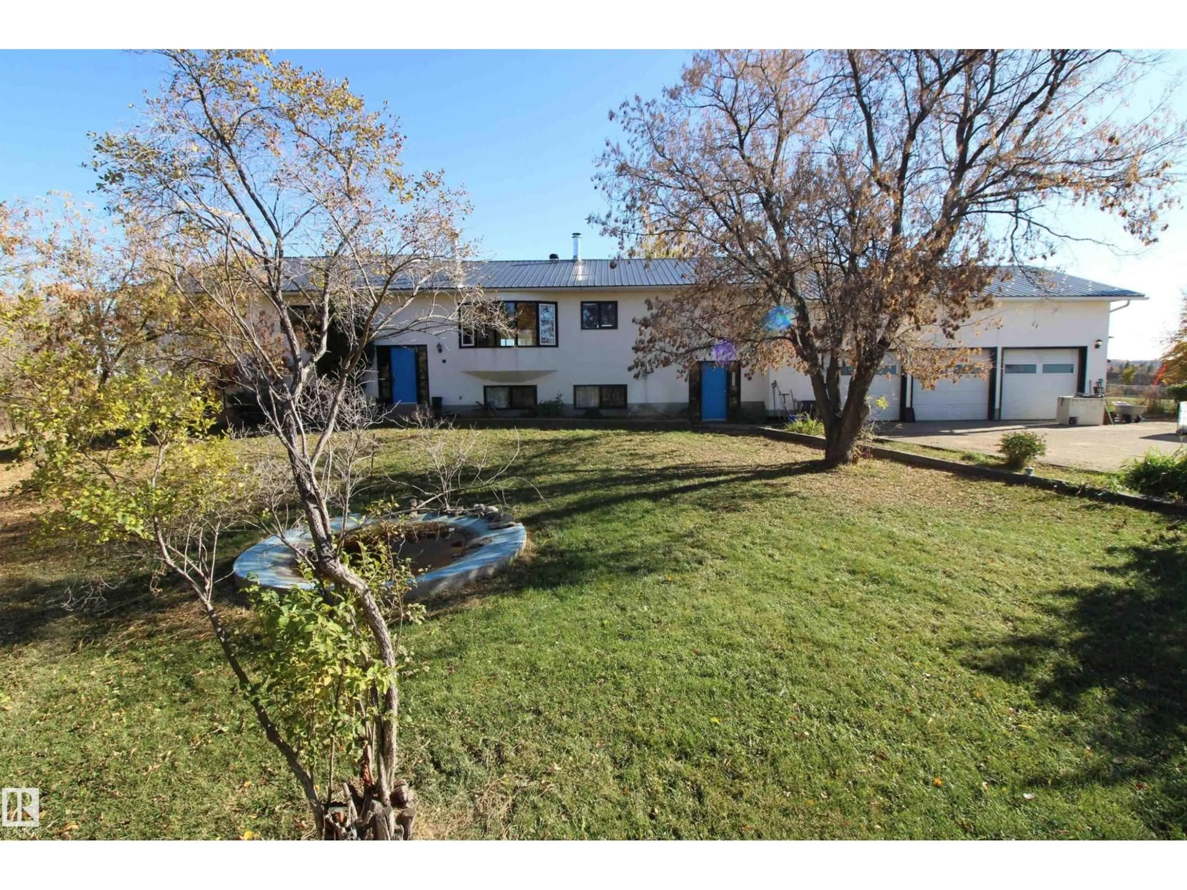 A pic from outside/outdoor area/front of a property/back of a property/a pic from drone, water/lake/river/ocean view for 53021 RGE ROAD 73, Rural Parkland County Alberta T0E0S0